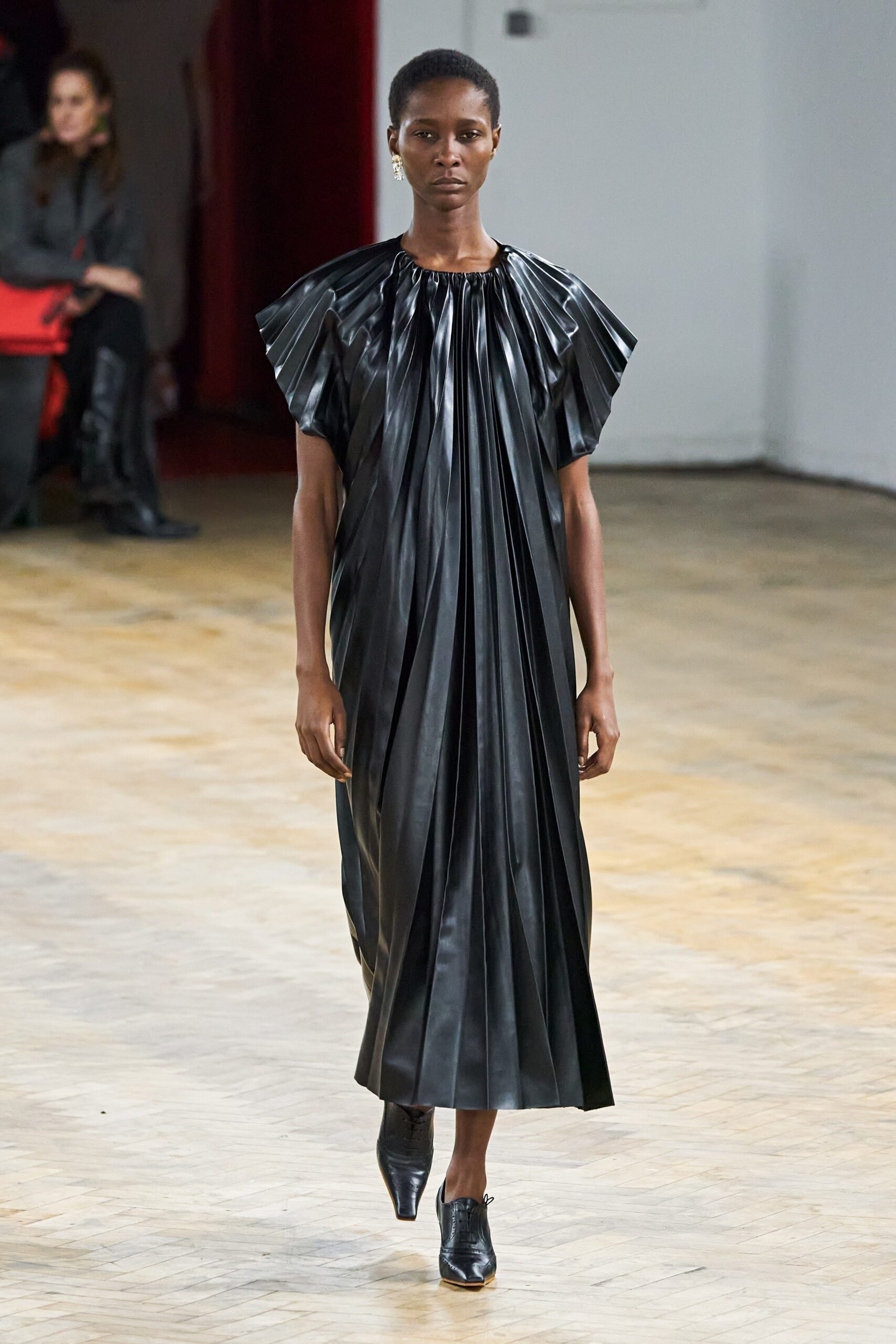 black pleated leather dress