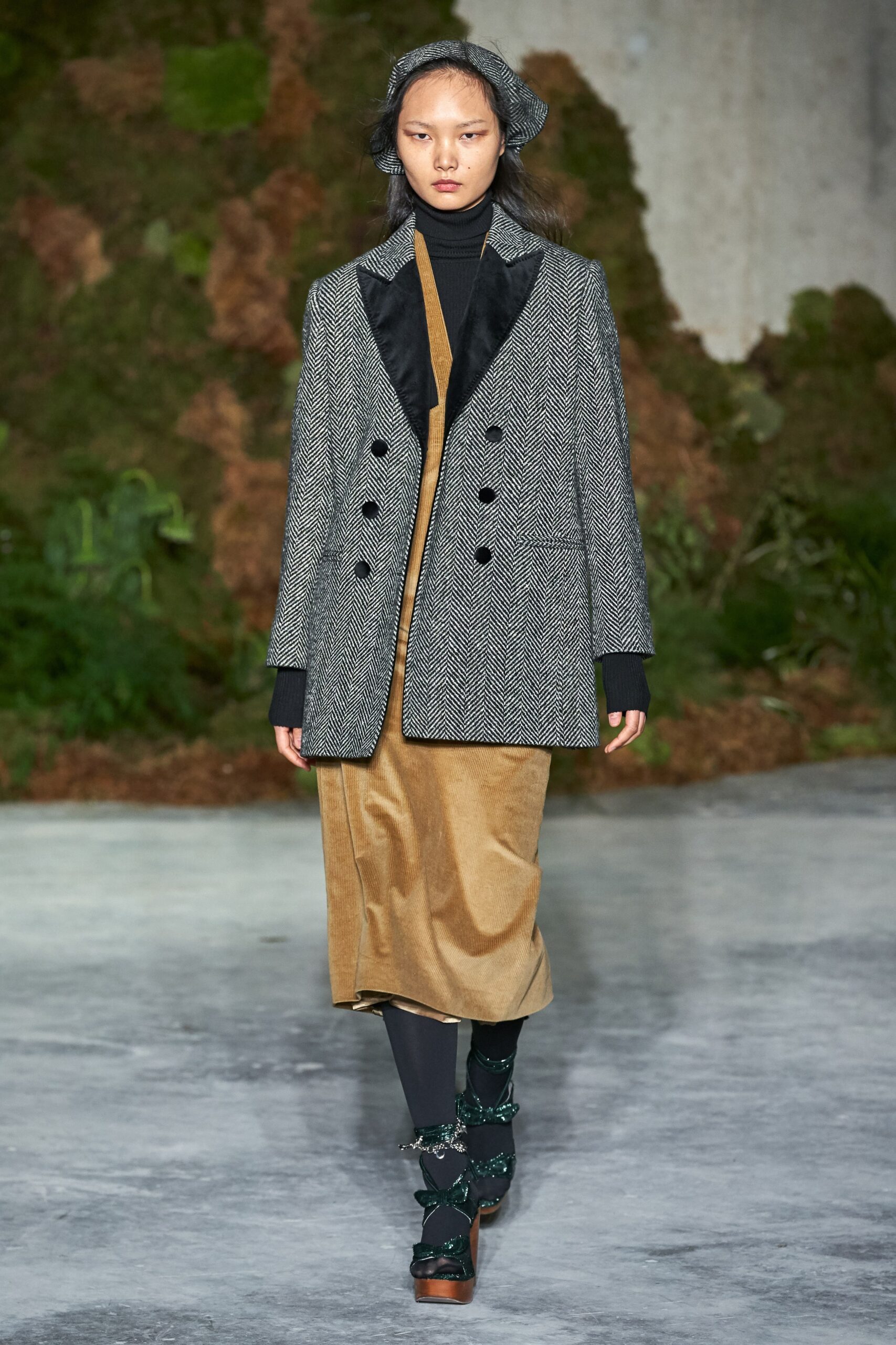 gray tailored coat and brown velvet dress