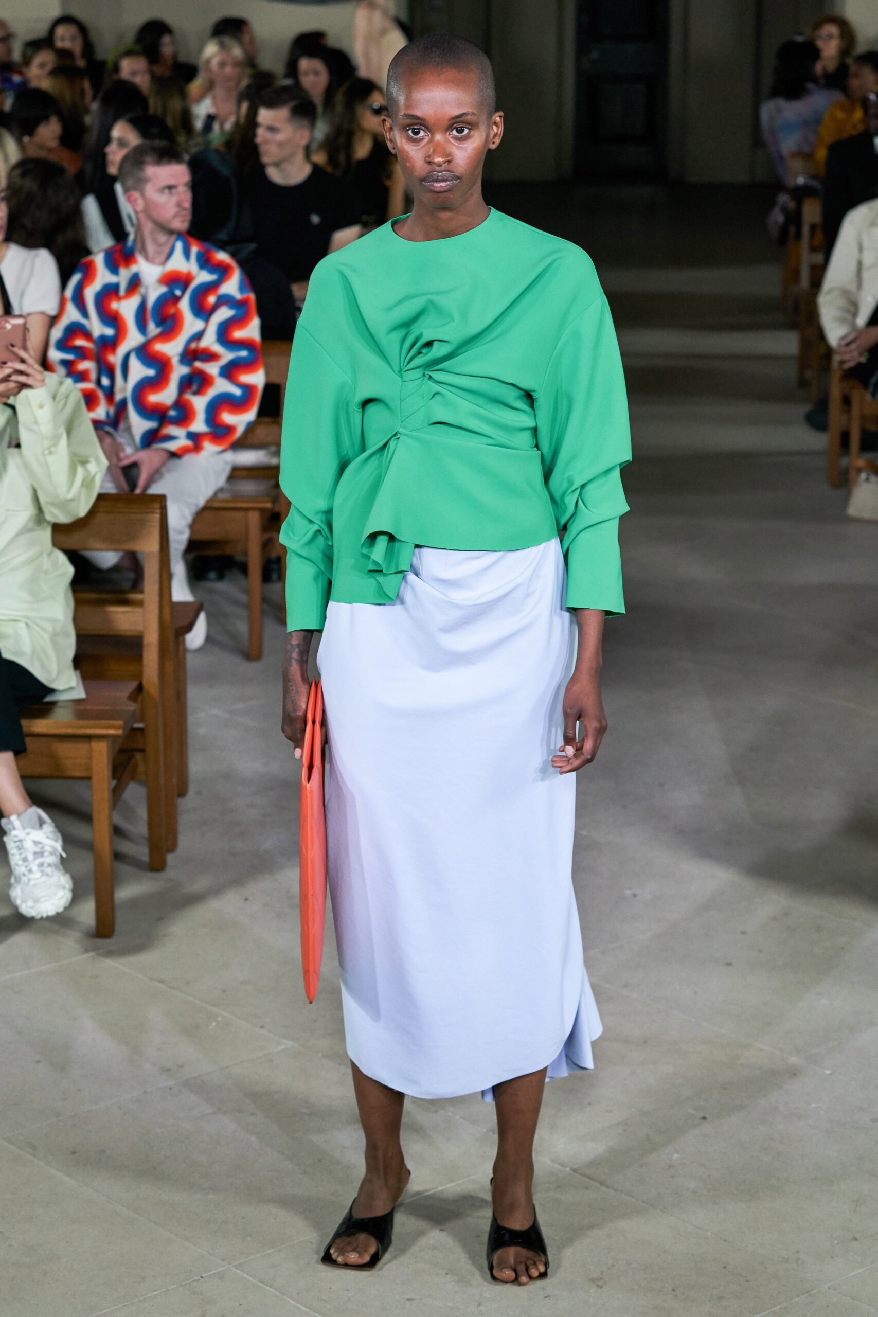 green top with light blue skirt