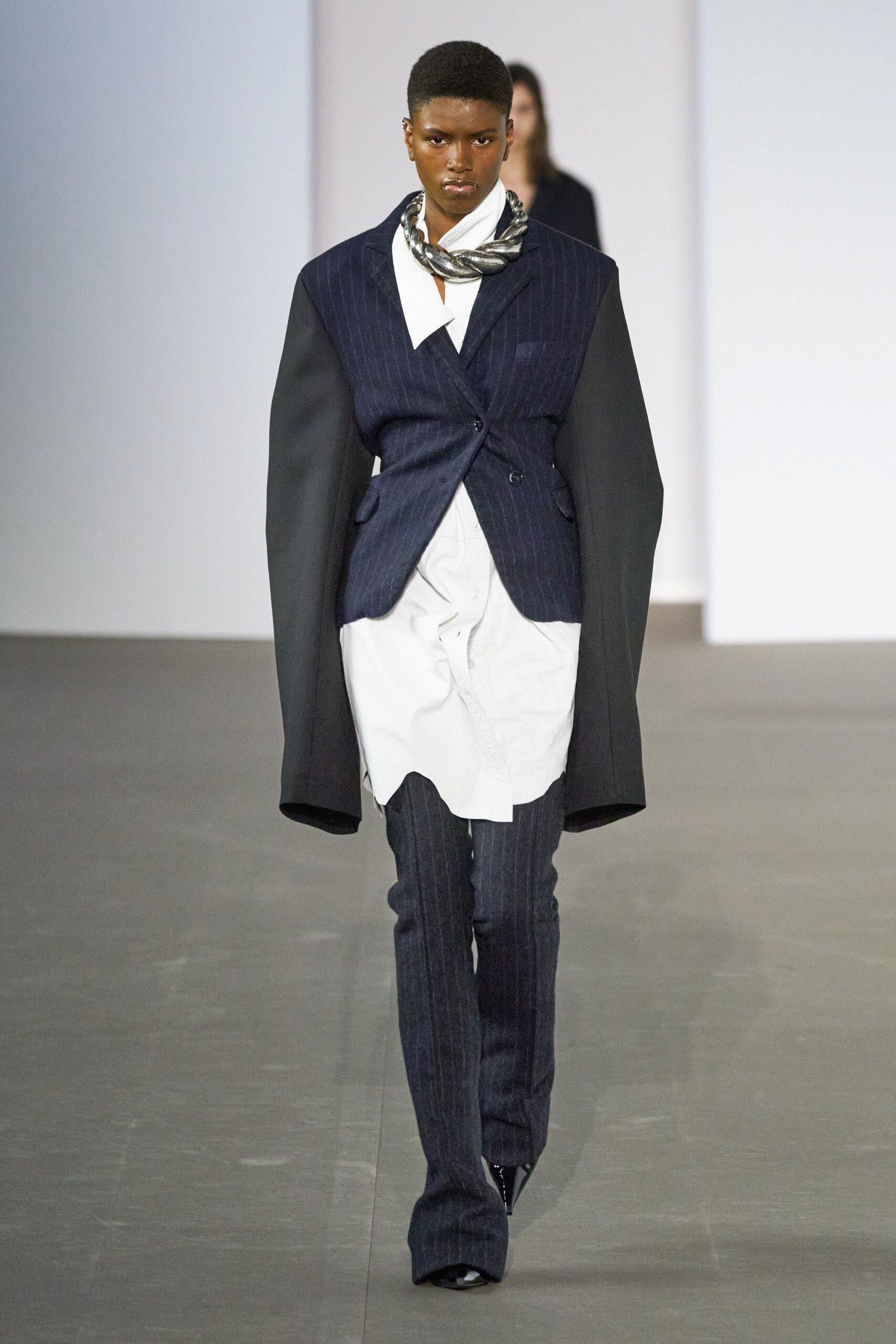 structured black blazer with white shirt