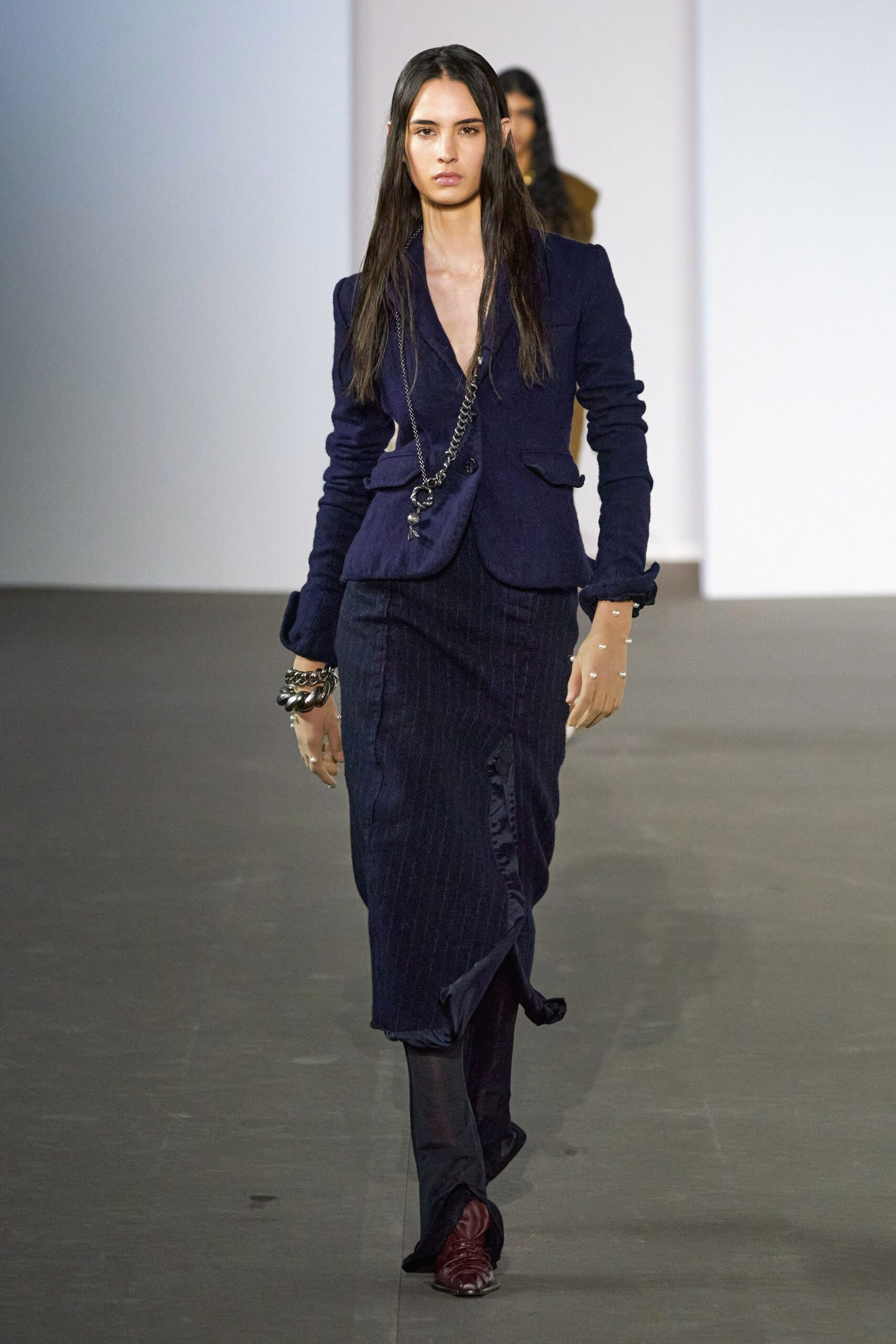 blue tailored blazer and pleated skirt