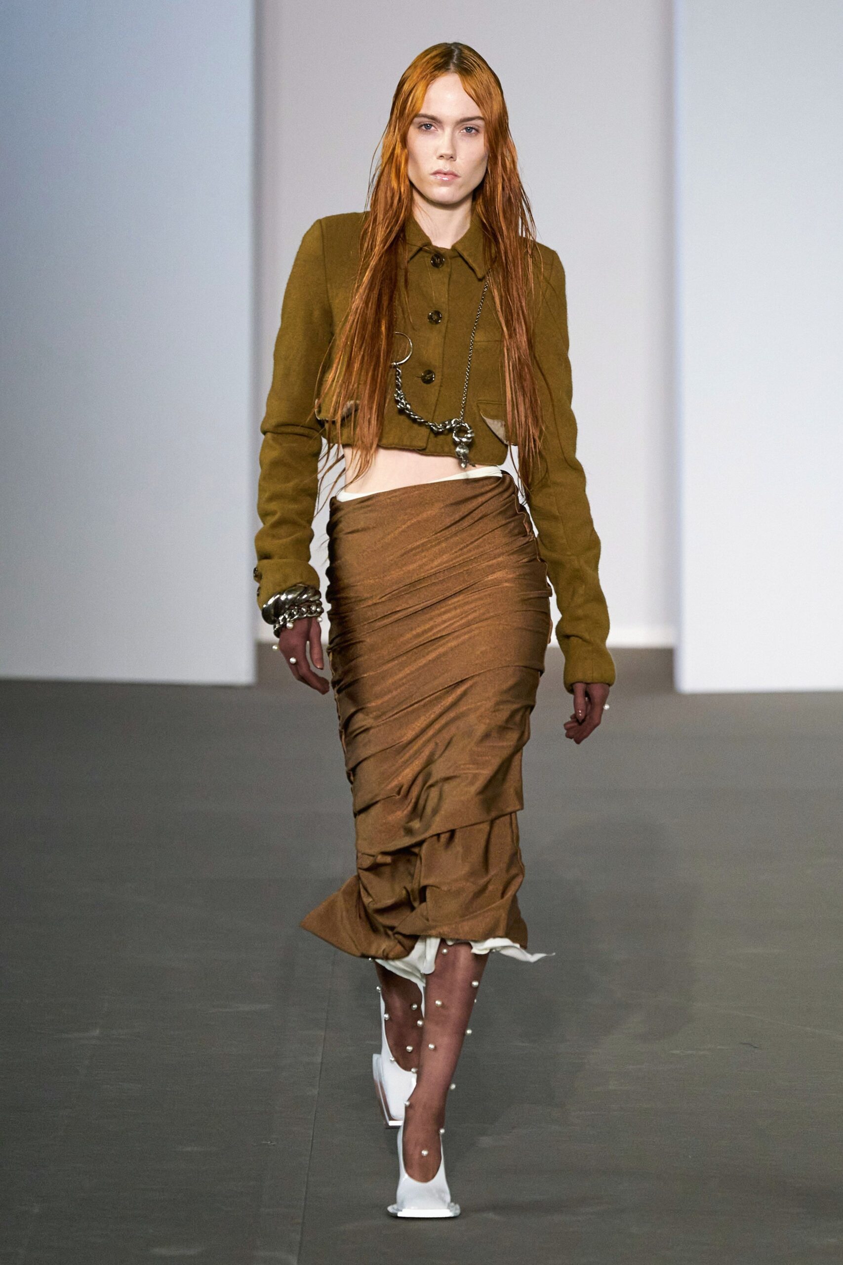 brown fitted top and skirt