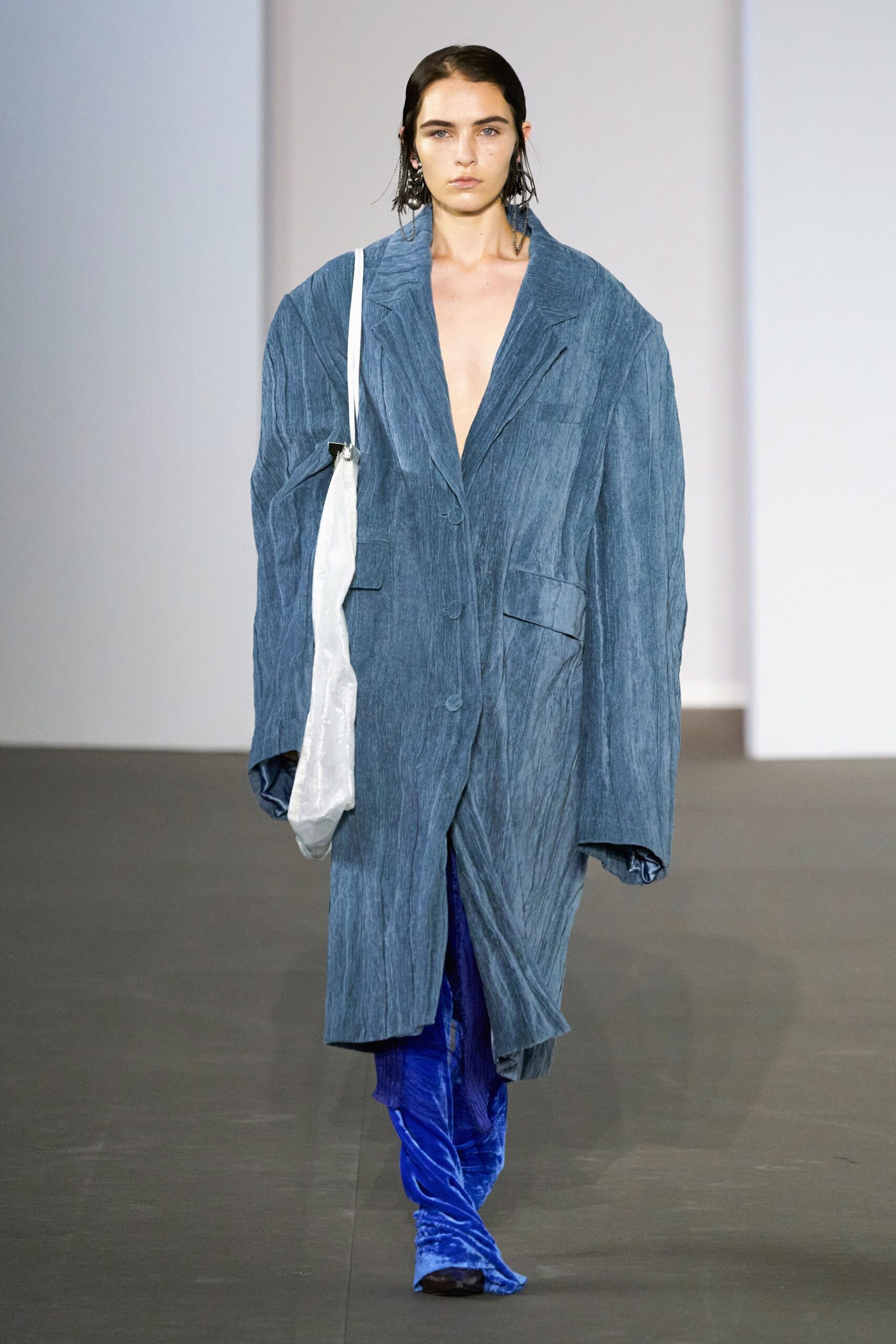 oversized blue denim coat with fitted pants