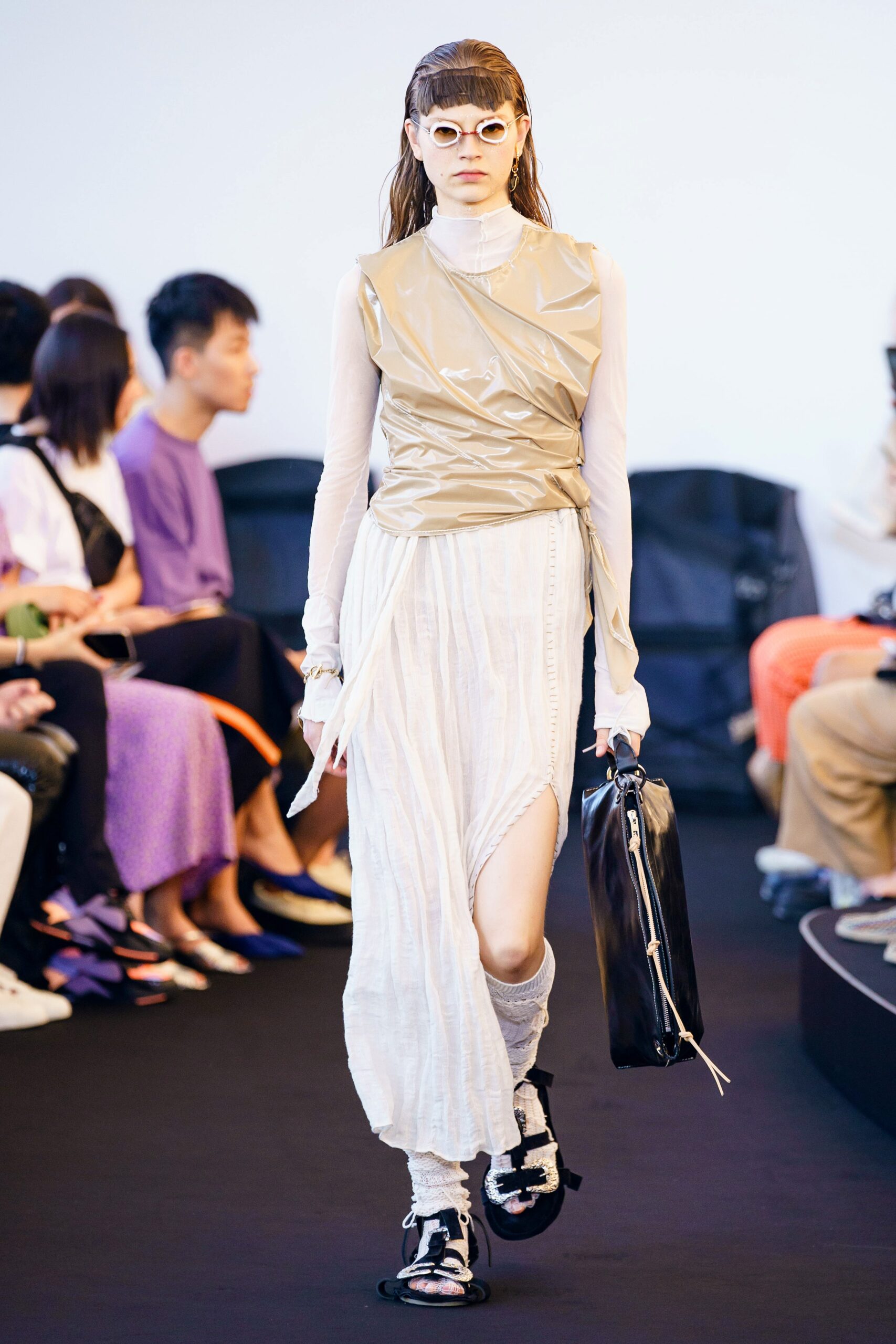 beige vinyl sleeveless high-neck fitted draped top