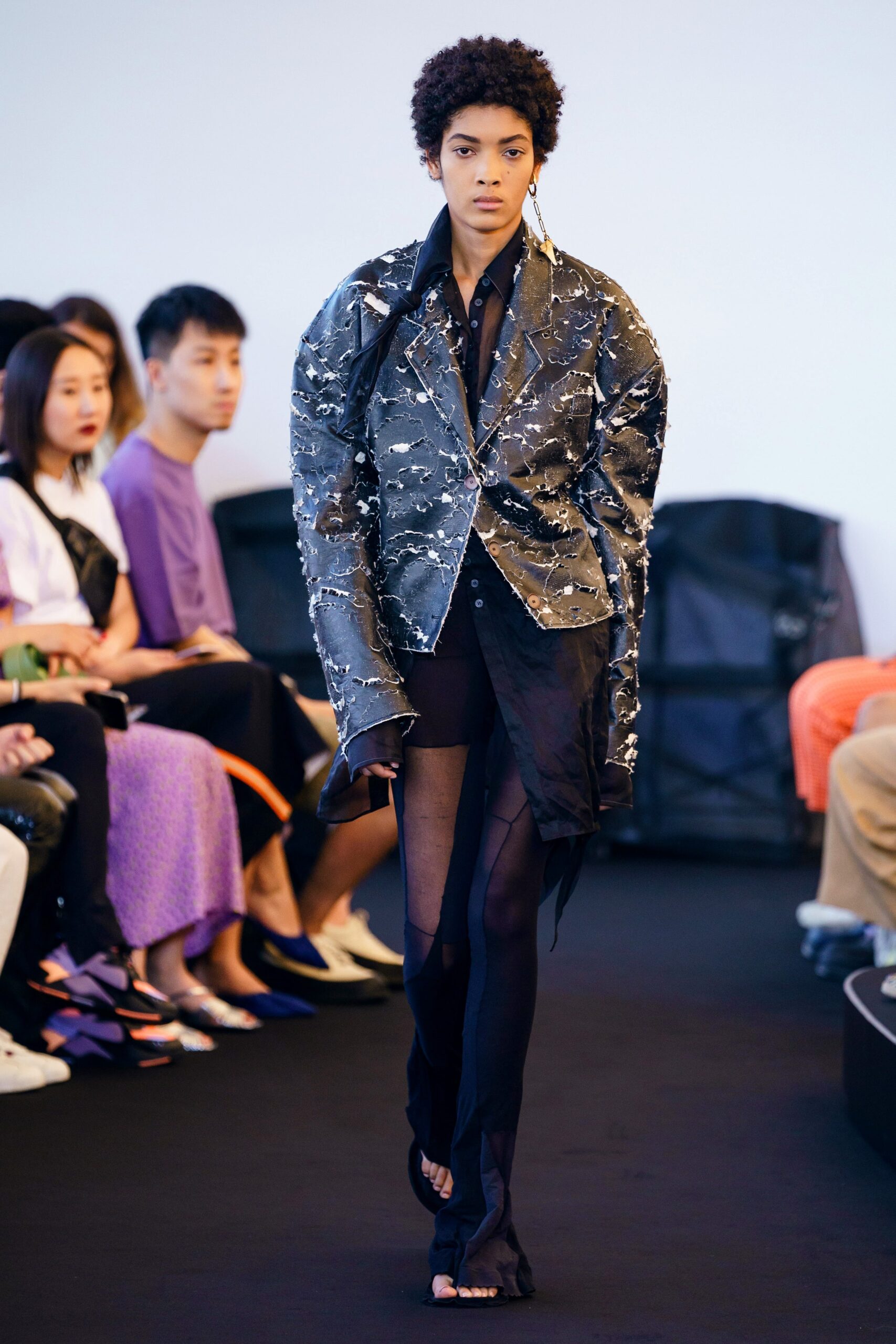 oversized black sequin jacket with fitted shorts