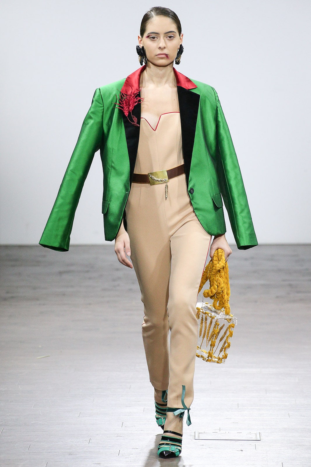green silk blazer with beige jumpsuit