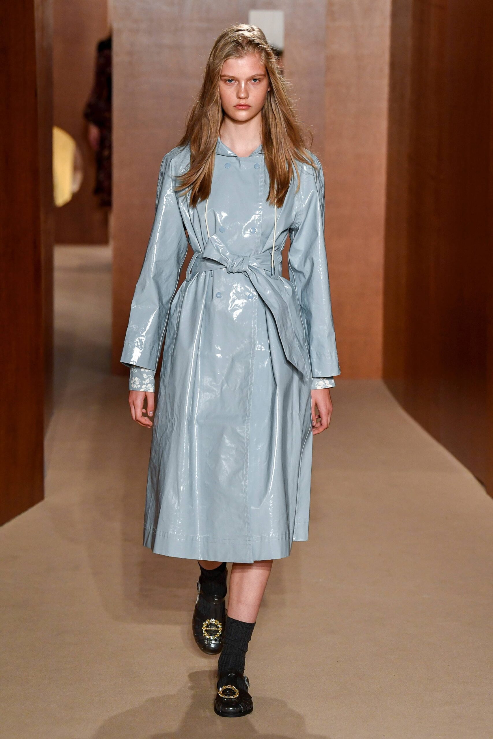 blue vinyl belted trench coat