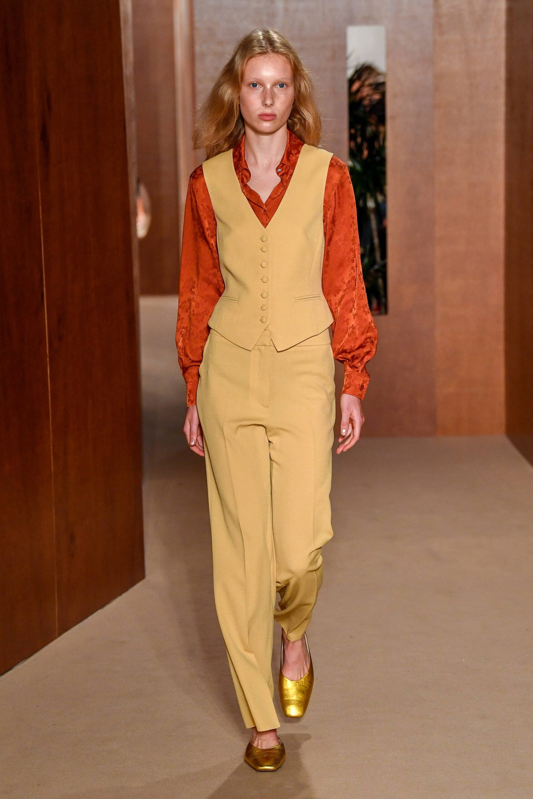 yellow fitted buttoned vest