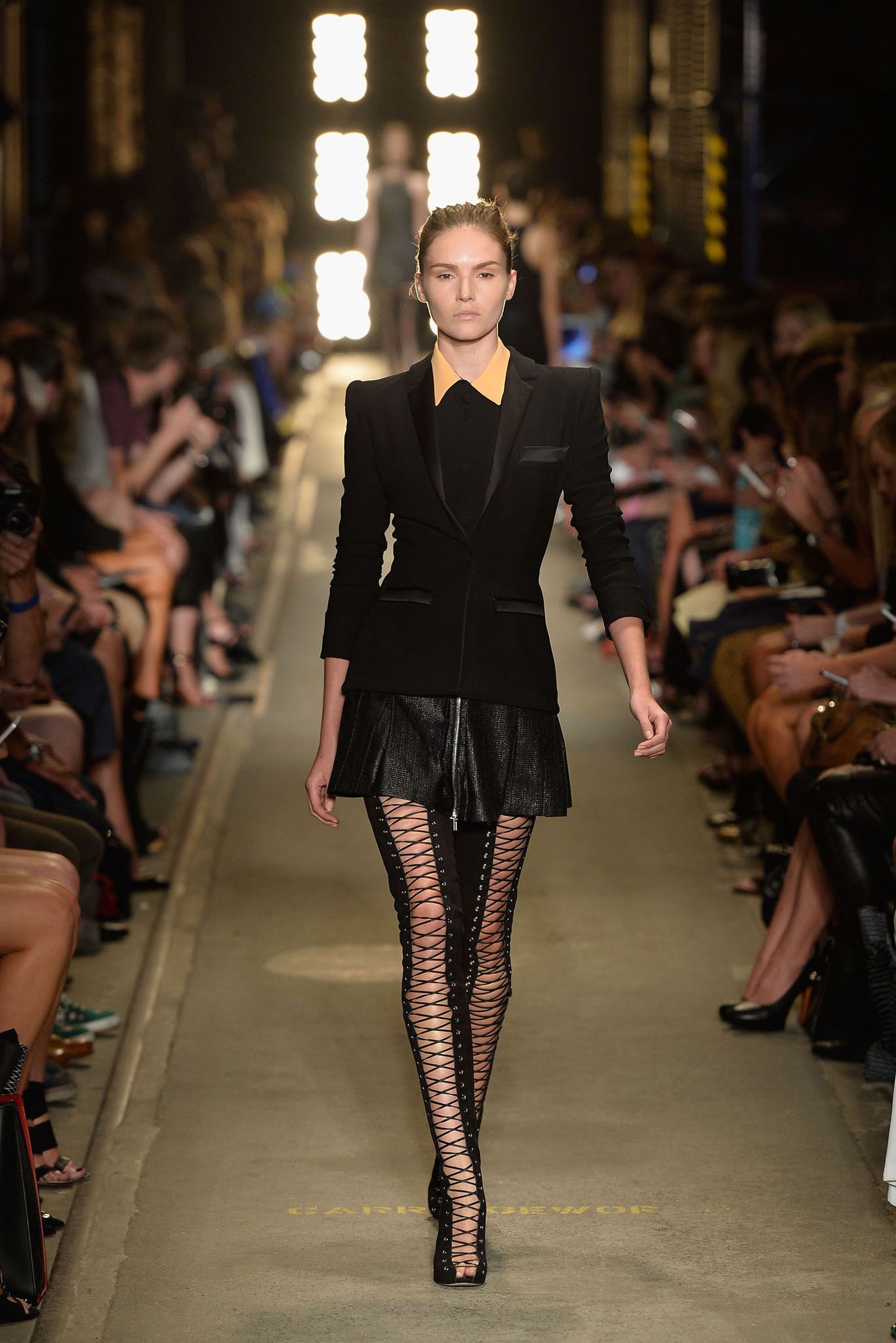 black tailored blazer with pleated skirt