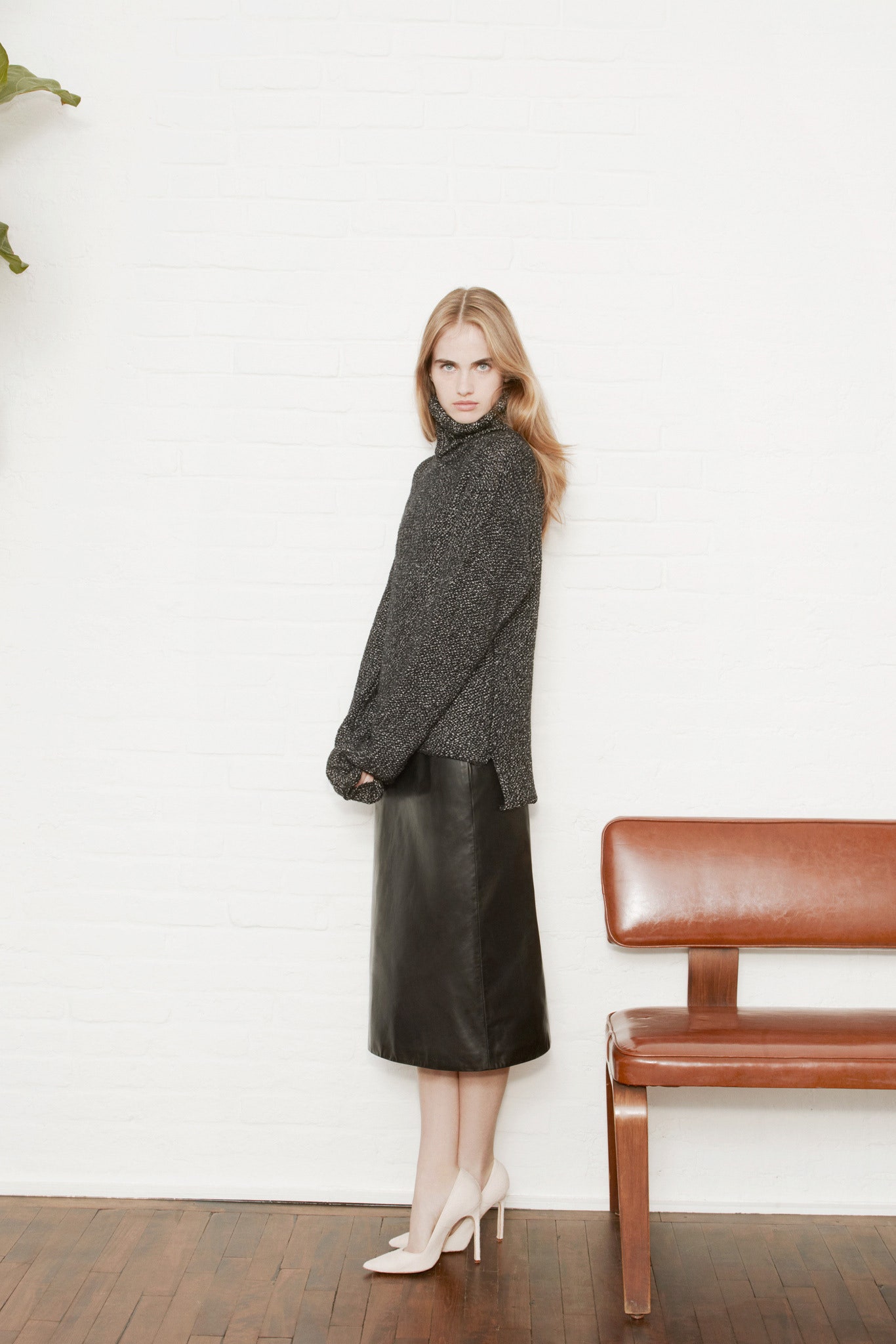 black wool long-sleeve turtleneck relaxed textured top