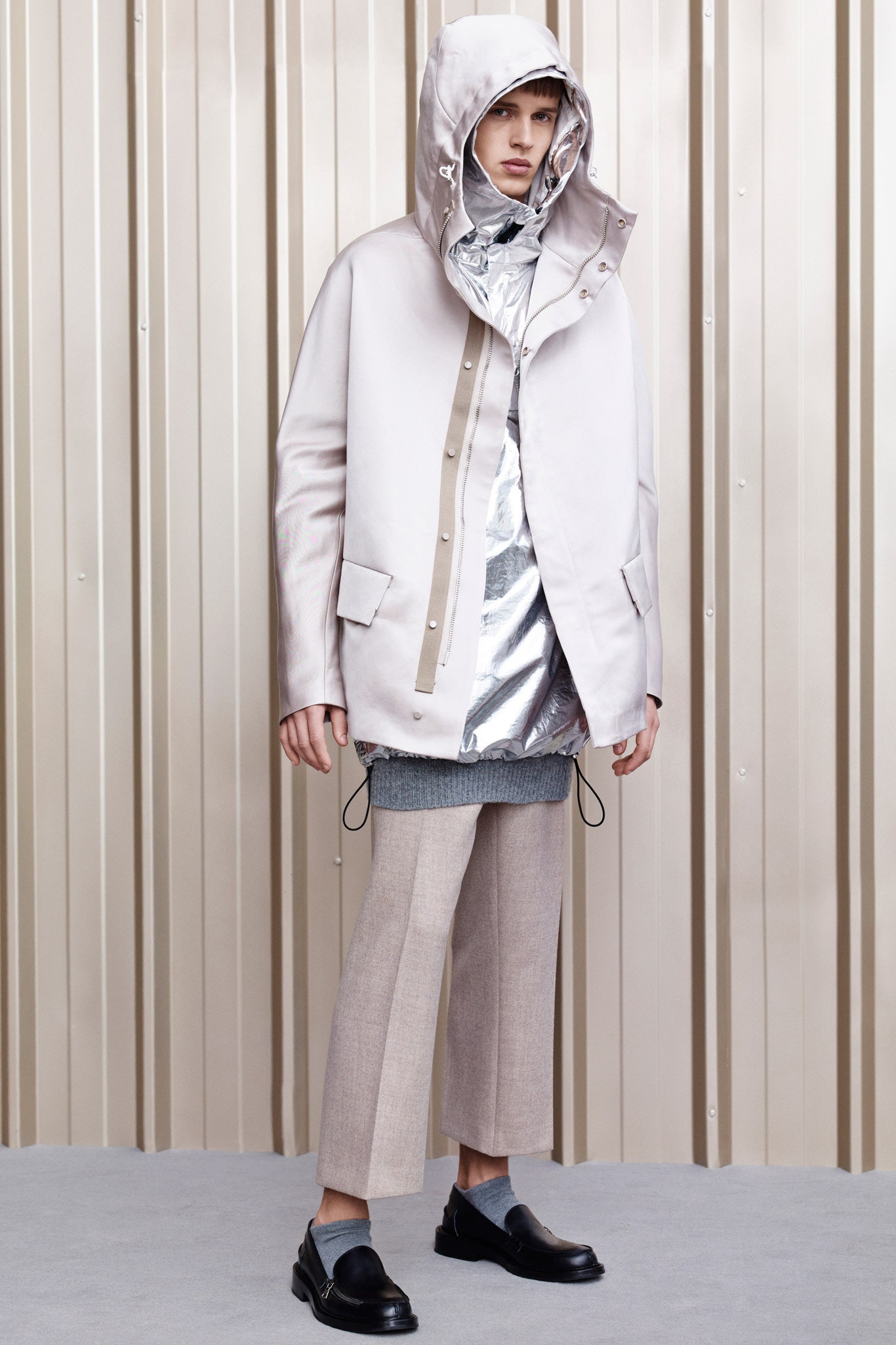 beige jacket with silver shirt