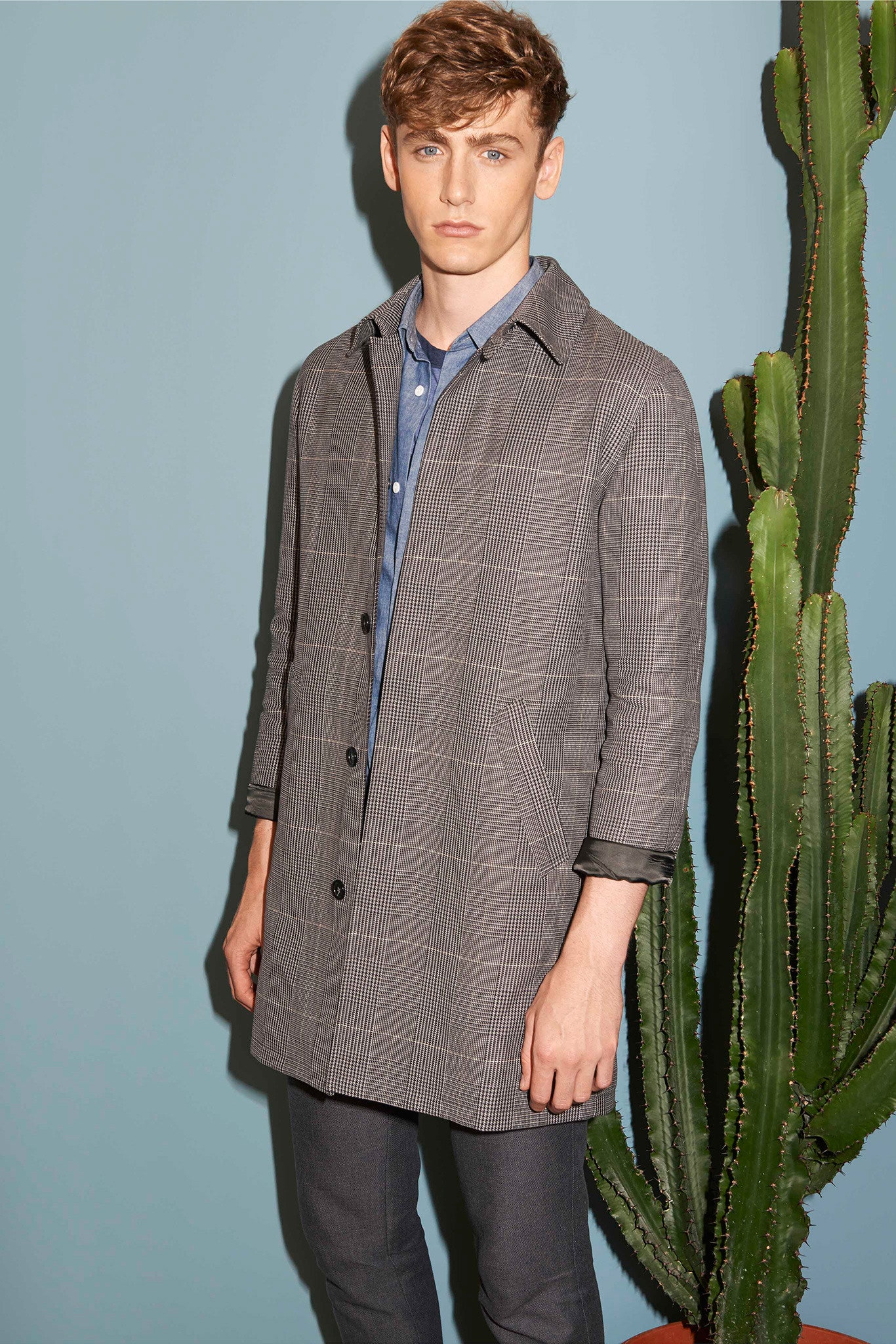 gray checked coat with blue shirt