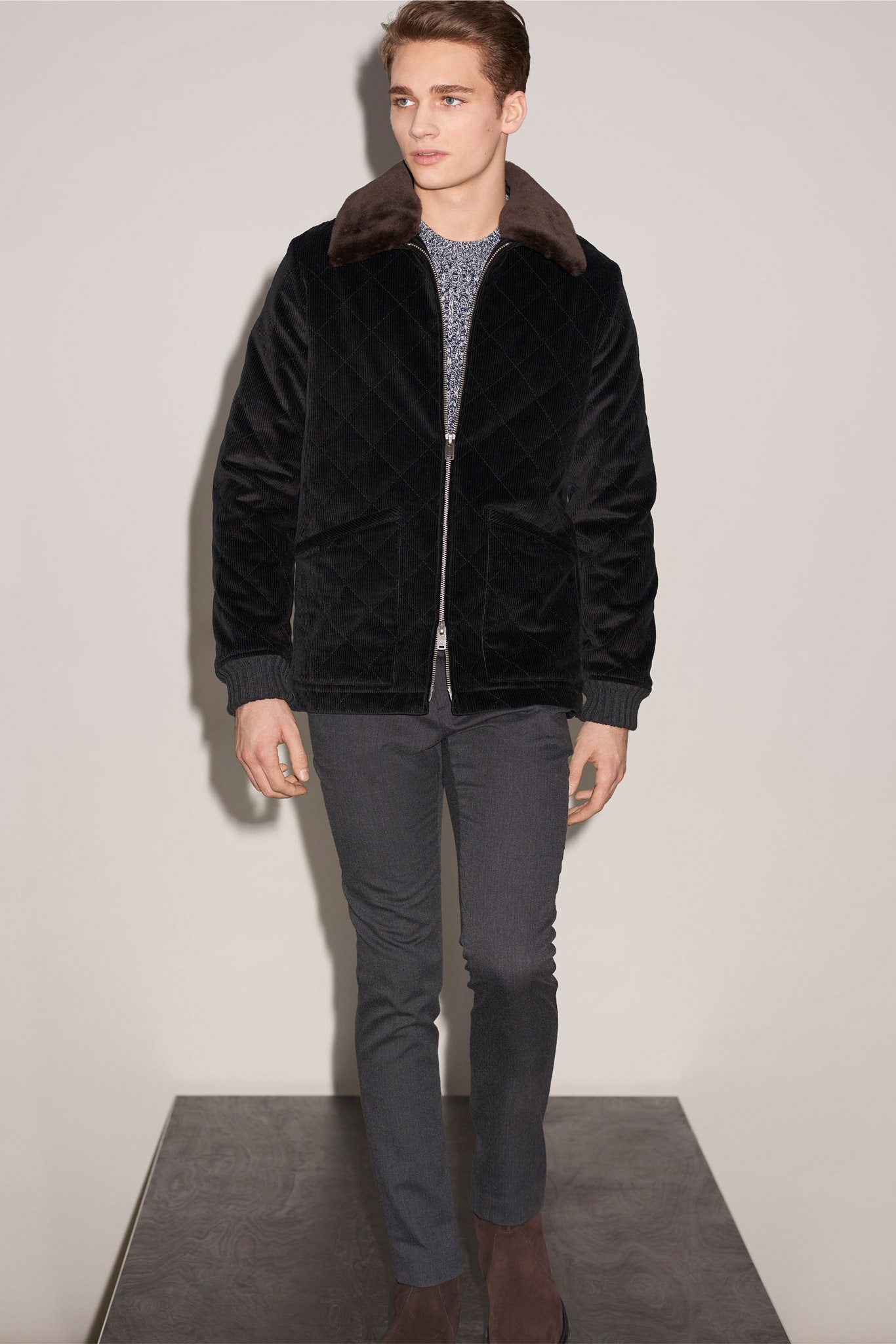 black velvet jacket with gray pants