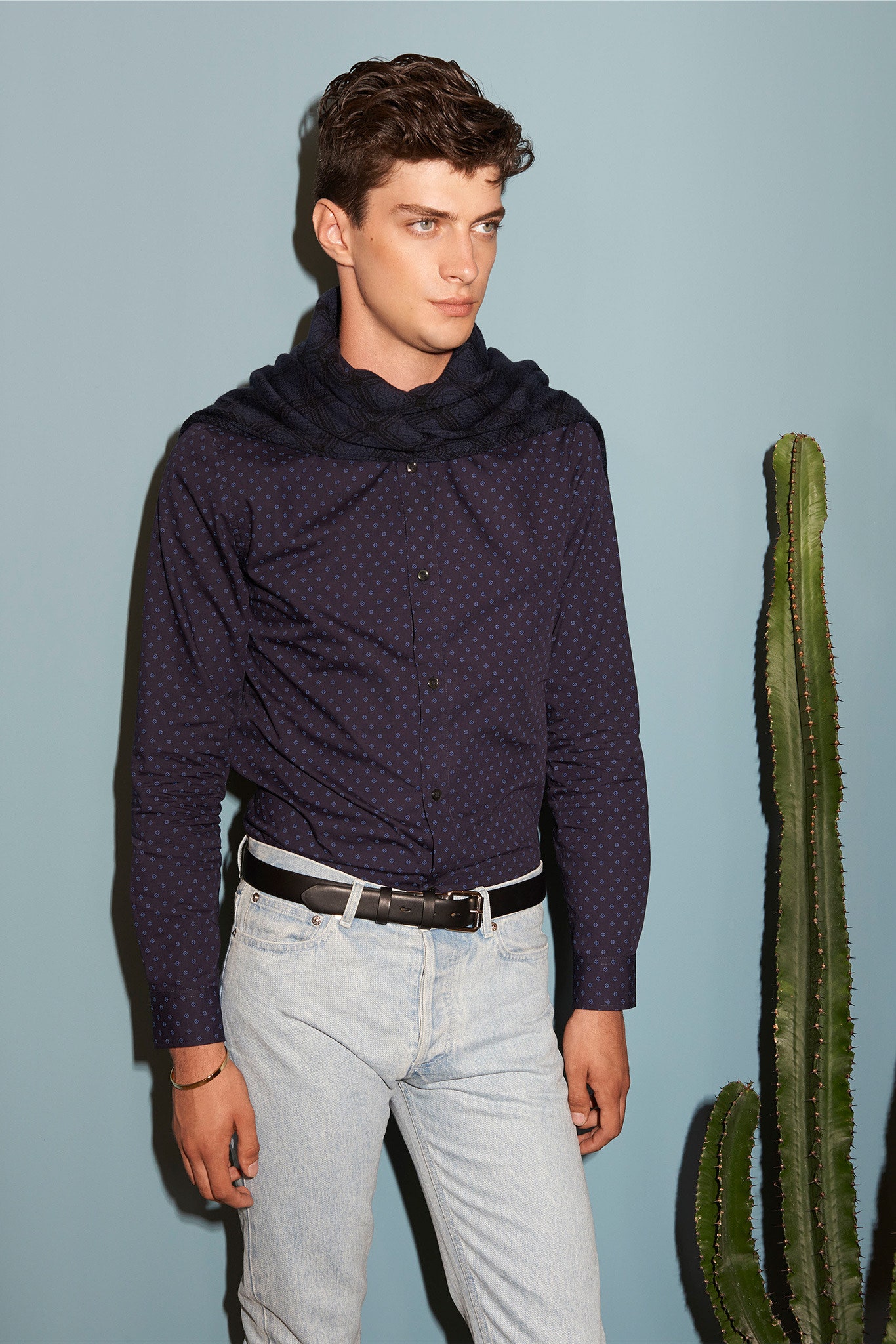 blue polka-dot shirt with denim pants