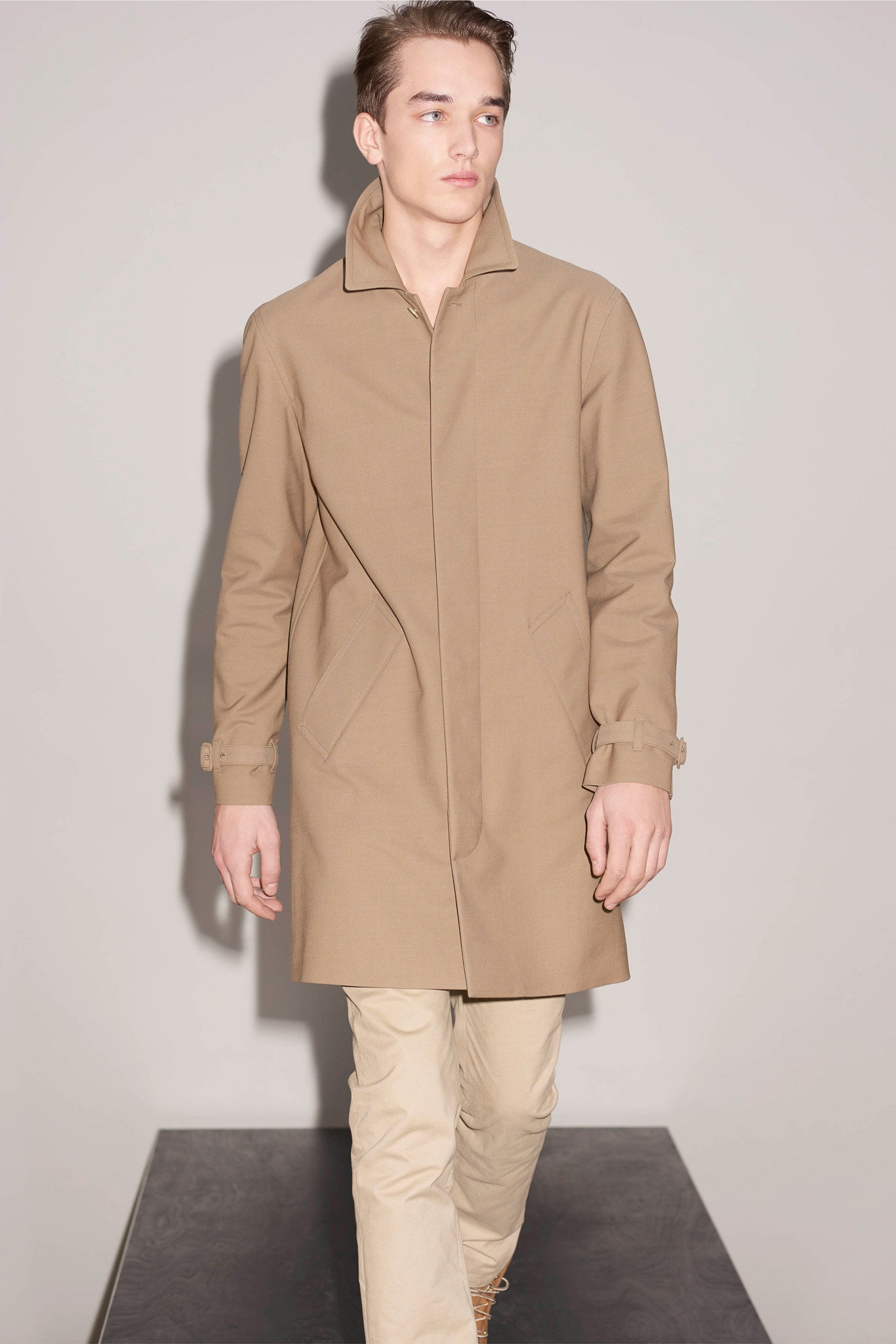 beige tailored coat with slim pants