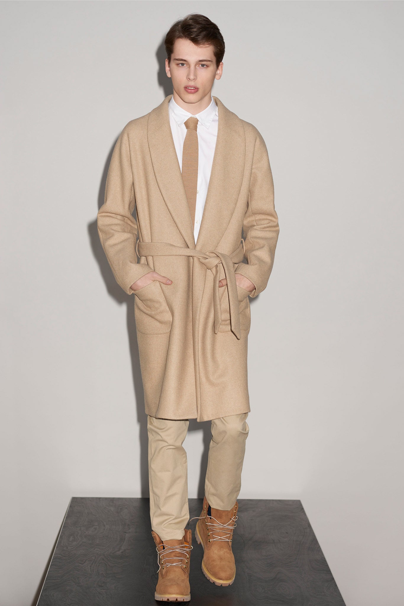 beige wool coat with tailored pants