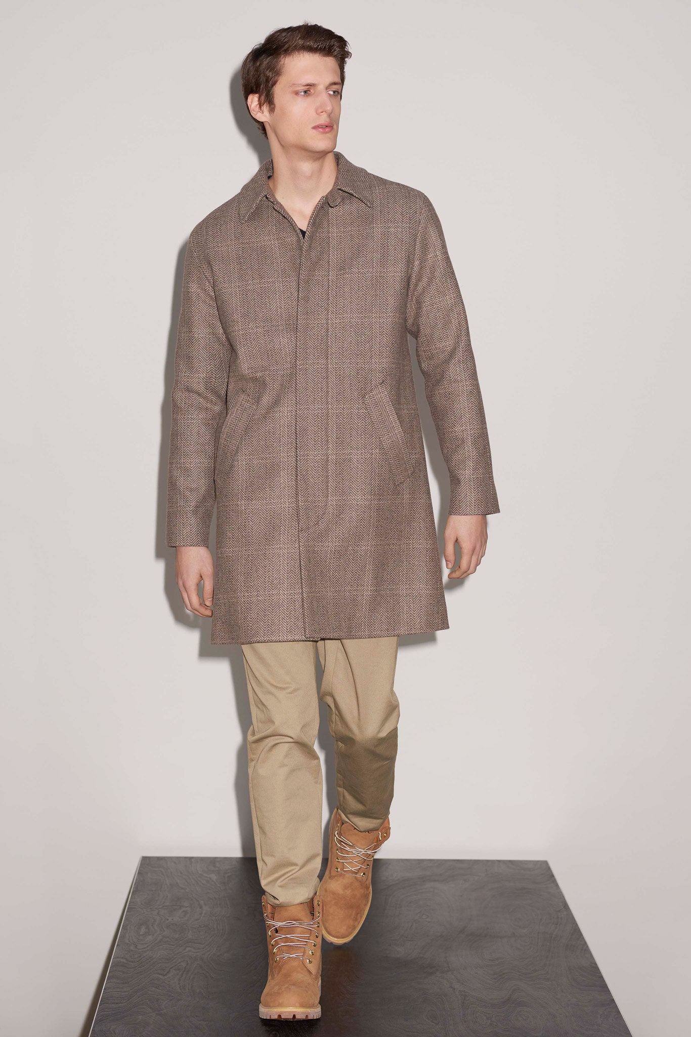 brown wool coat with beige pants