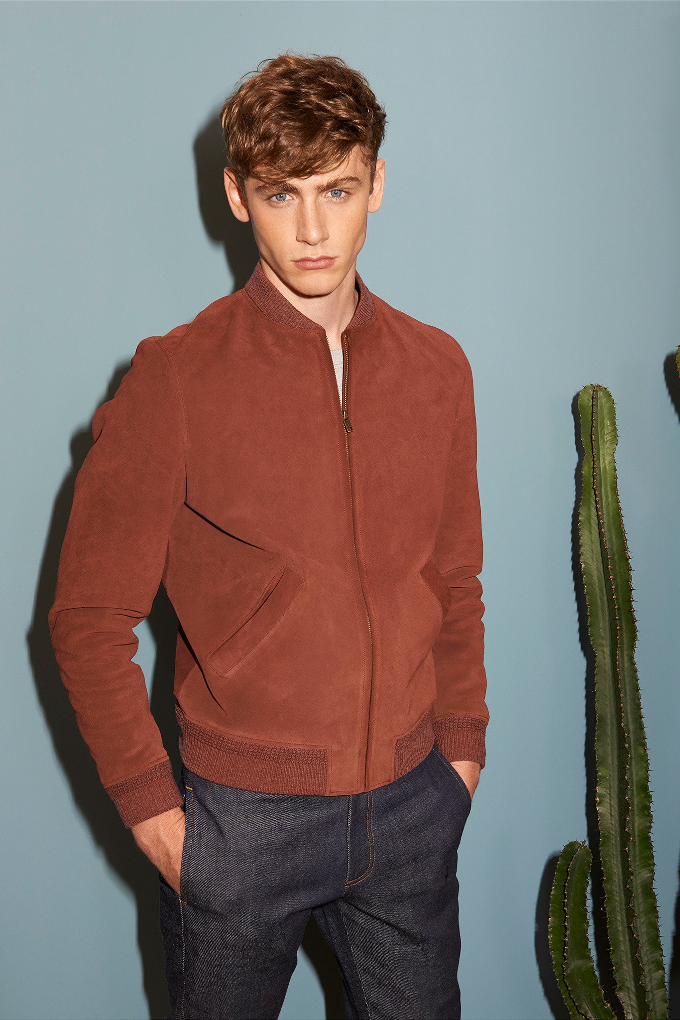 brown suede fitted jacket with denim pants