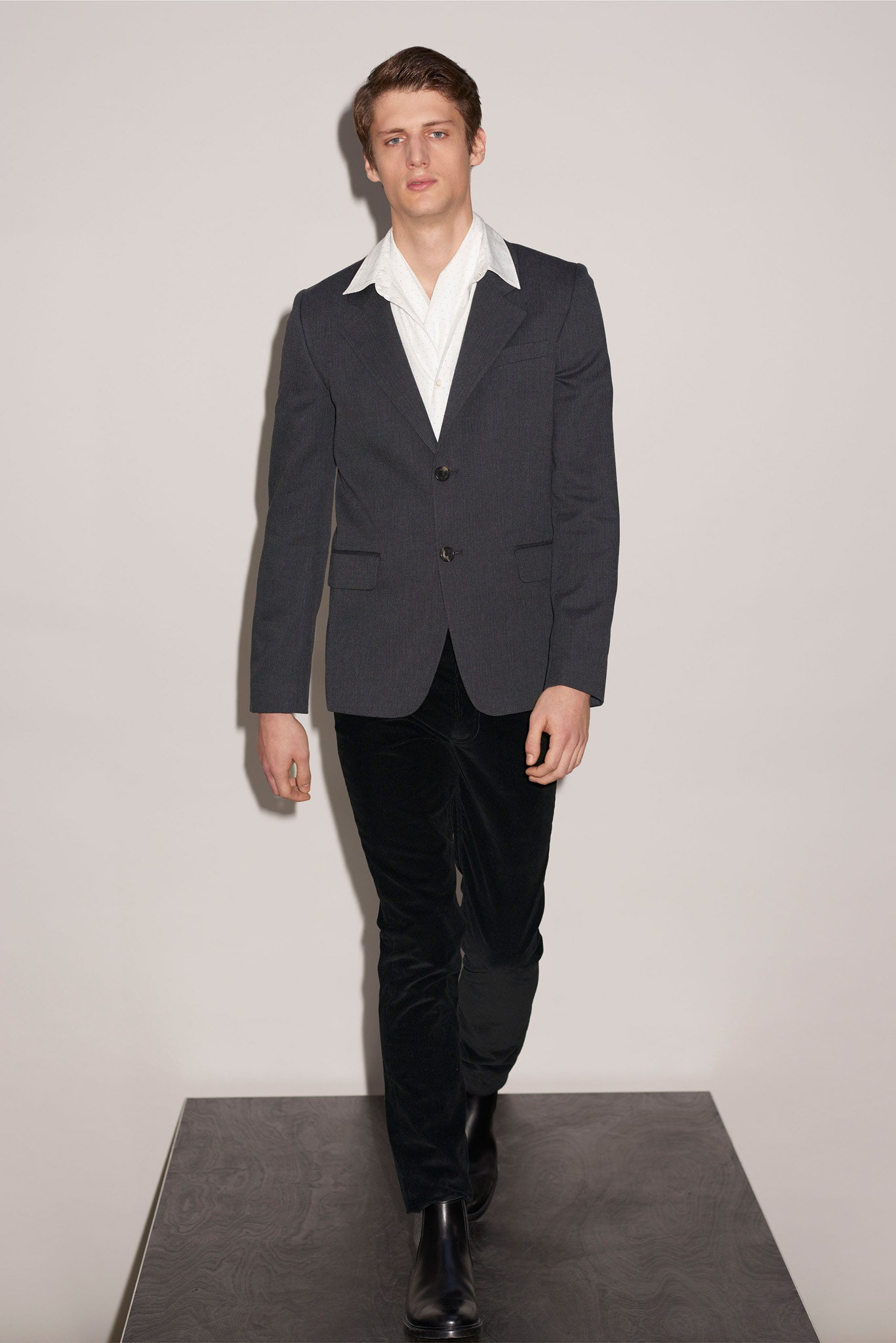 gray tailored blazer with white shirt