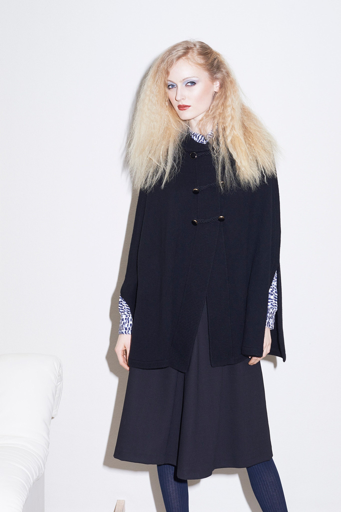 black wool long-sleeve collared relaxed buttoned cape