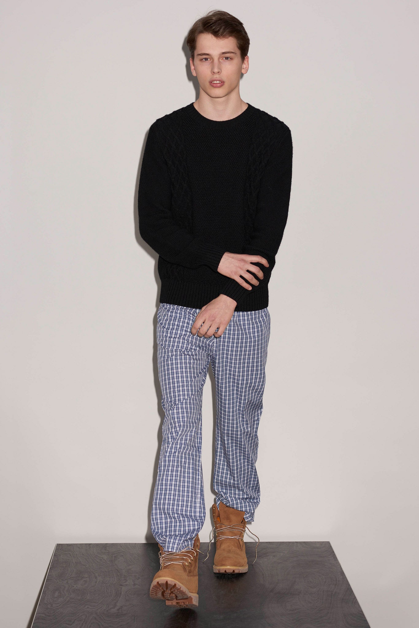 black sweater with checkered pants