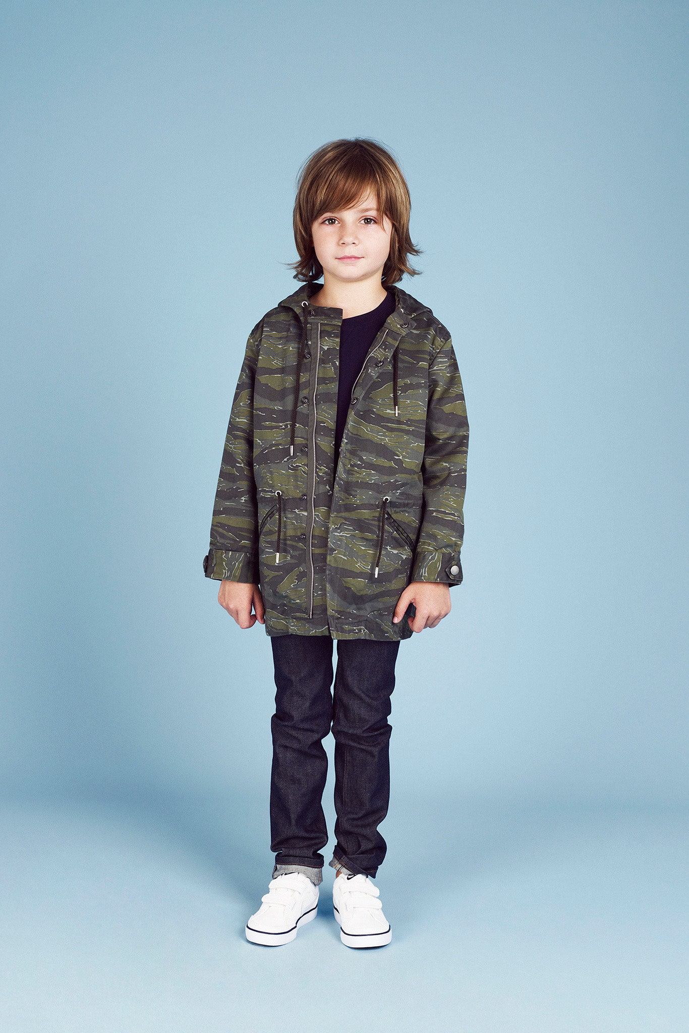 green camouflage jacket with black t-shirt