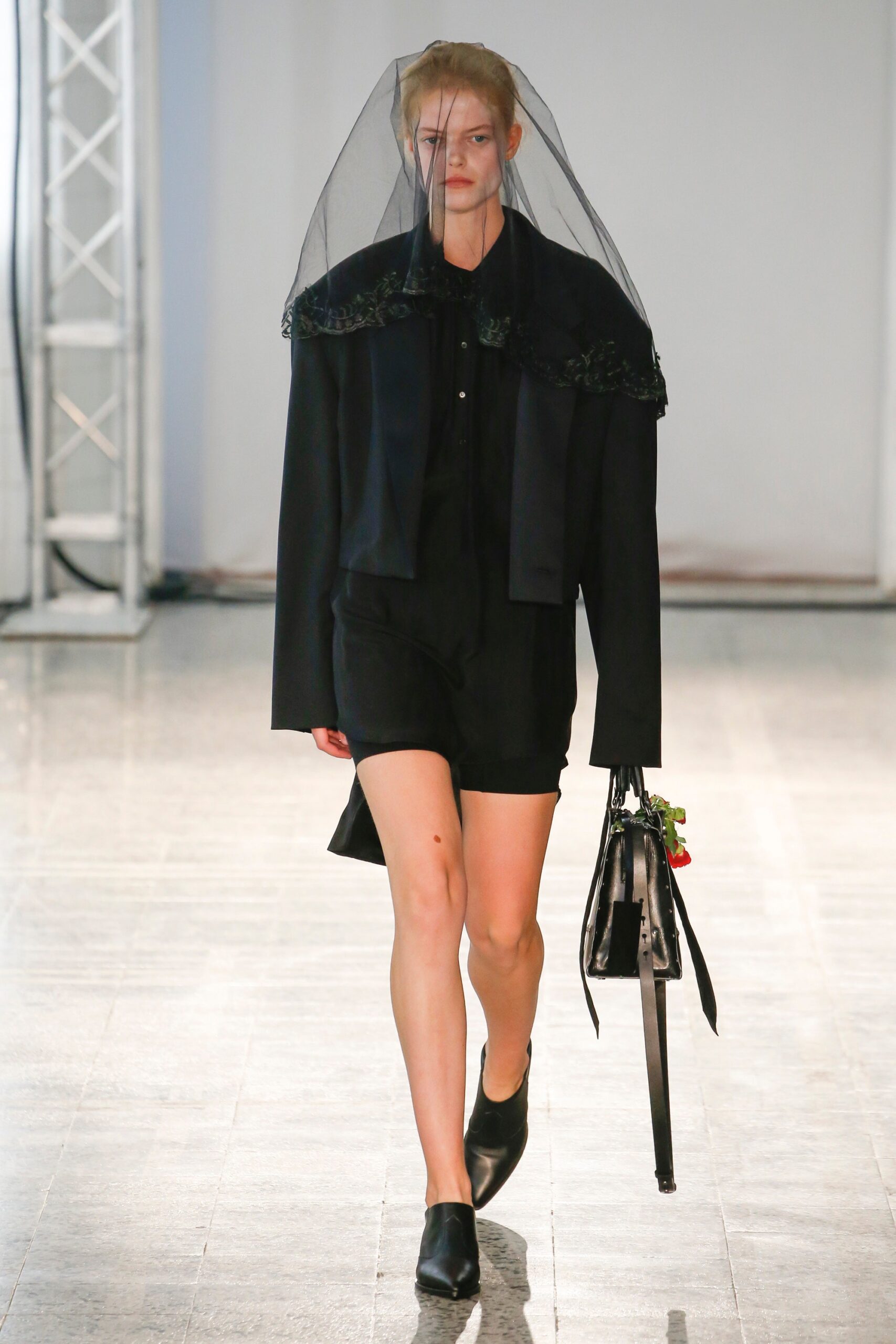 black fitted coat and dress