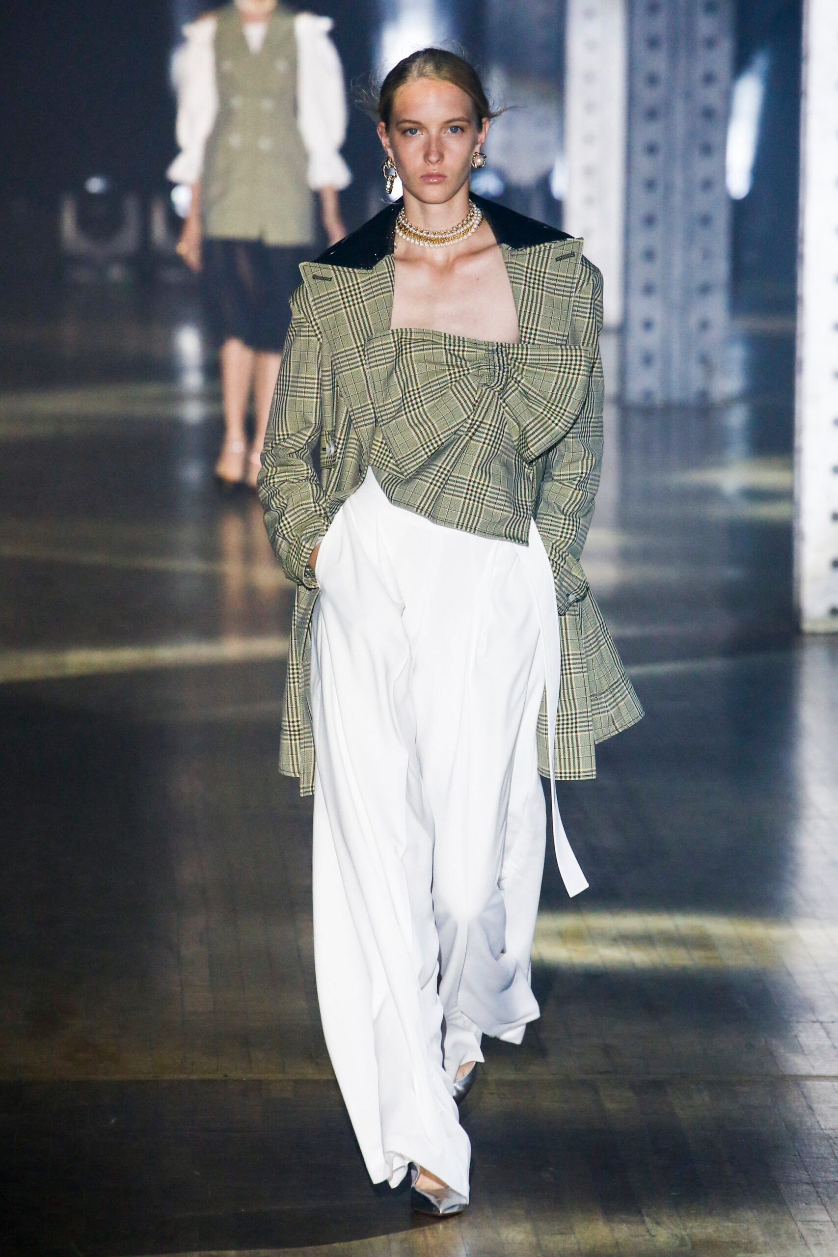 green checked blazer with white pants