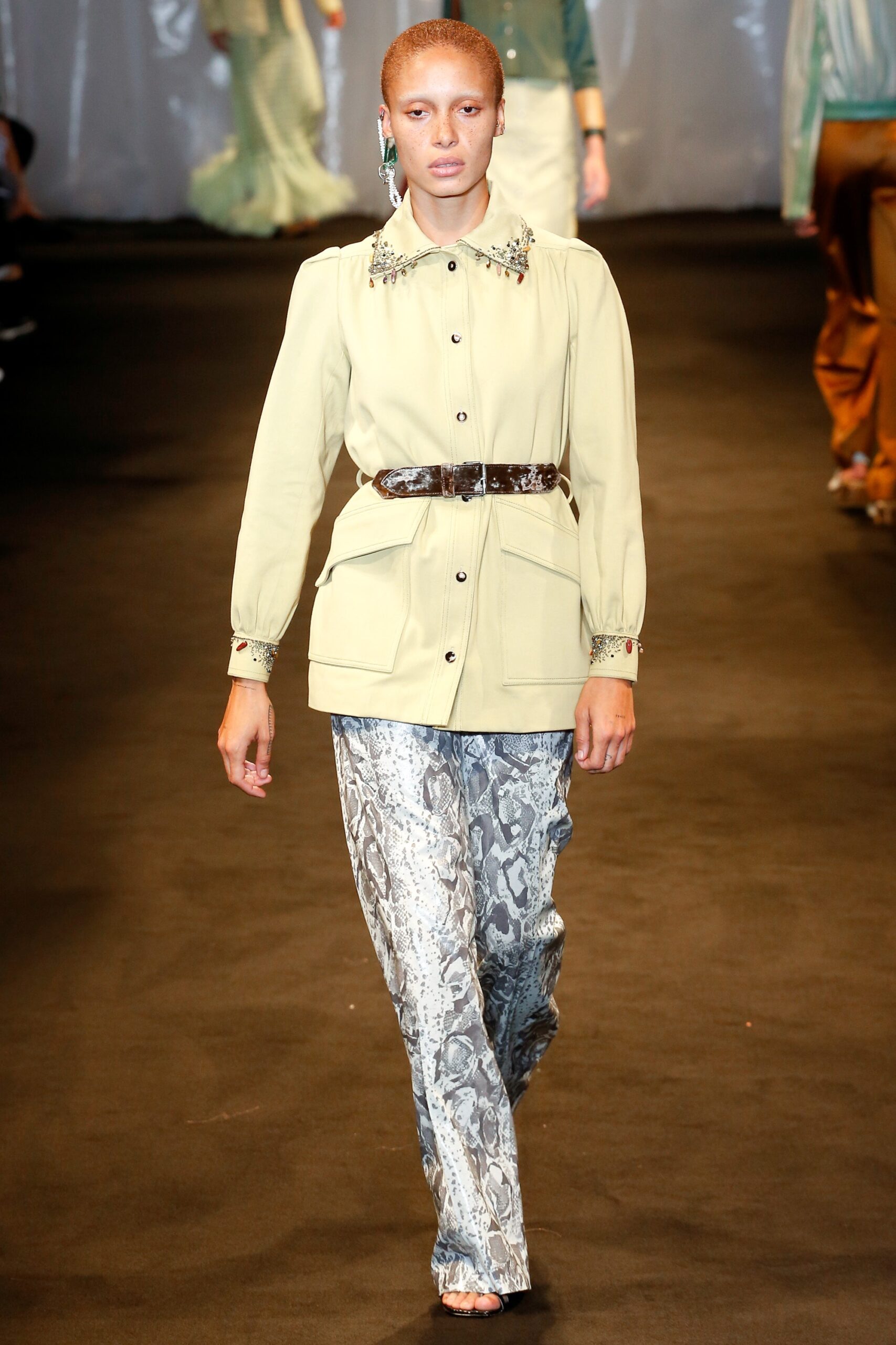 green blouse with printed pants