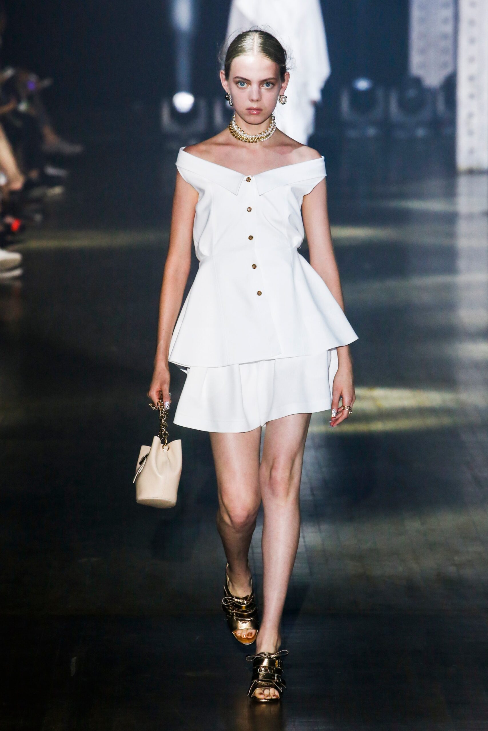 white off-shoulder top and skirt