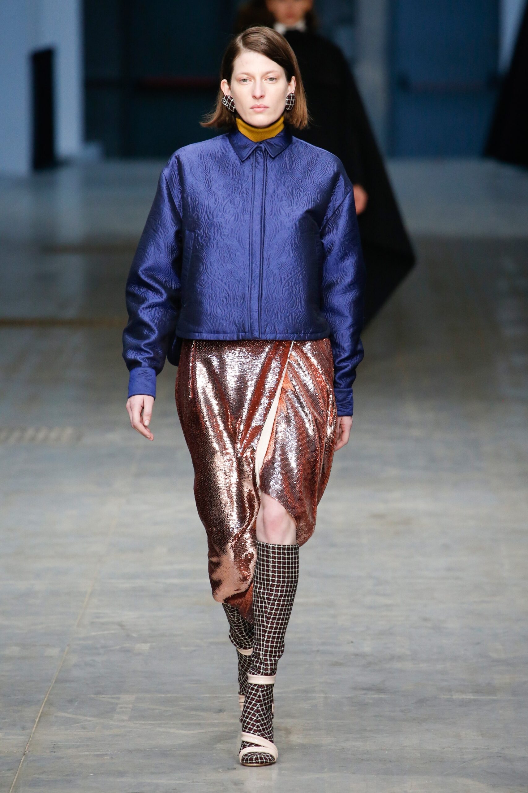 blue silk fitted jacket and rose gold skirt