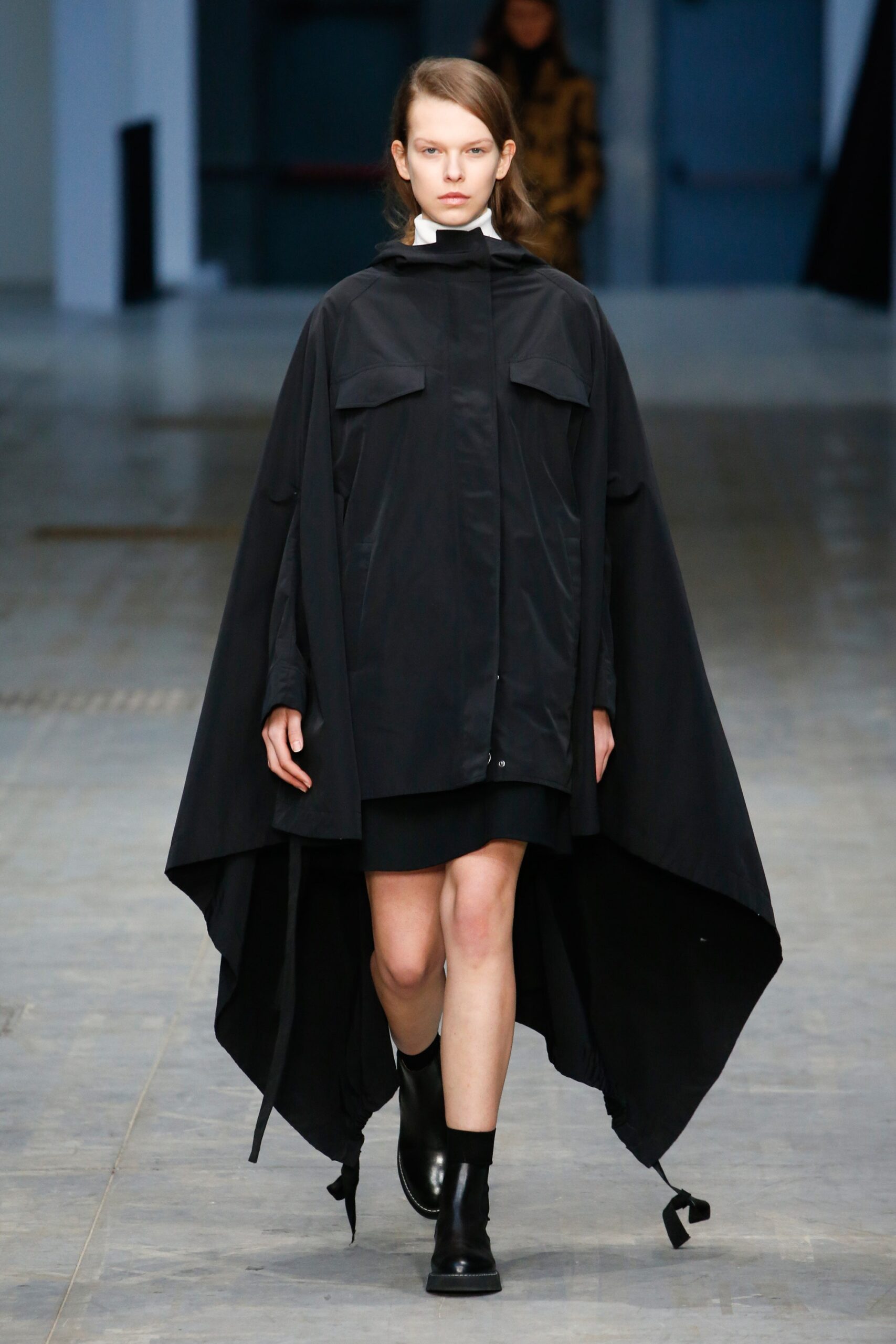 black cape and mini dress