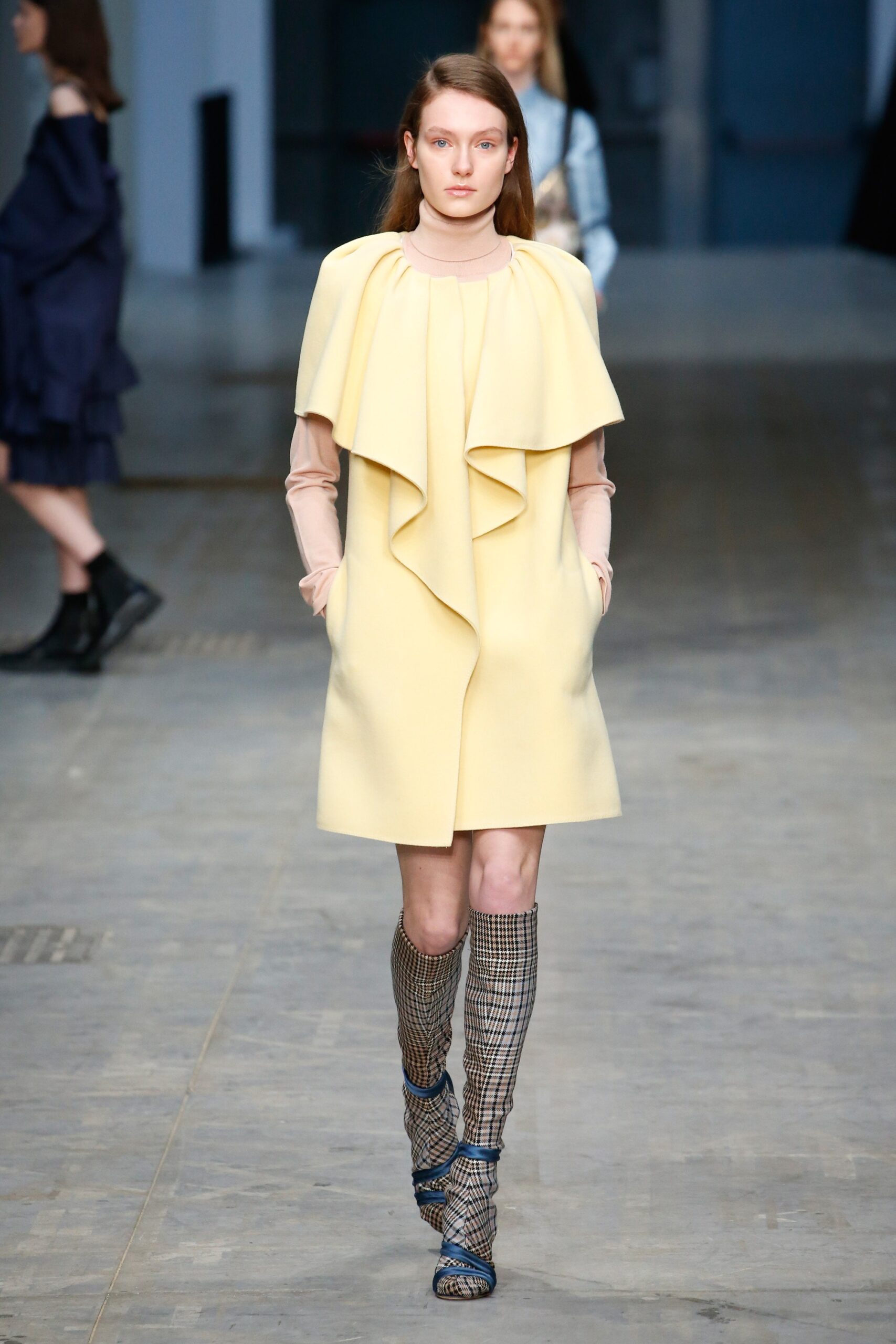 yellow wool cape and beige dress