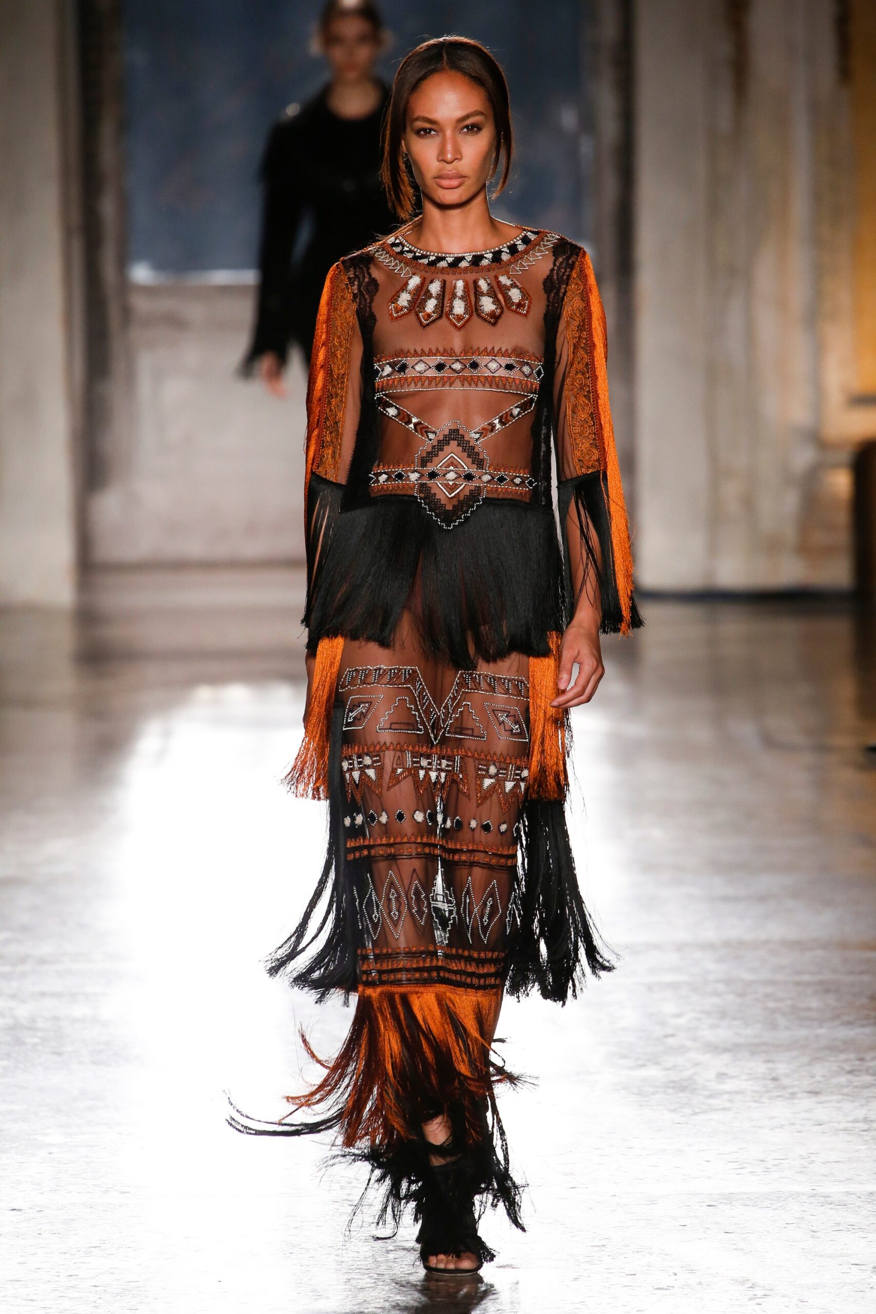 black and orange fringed dress