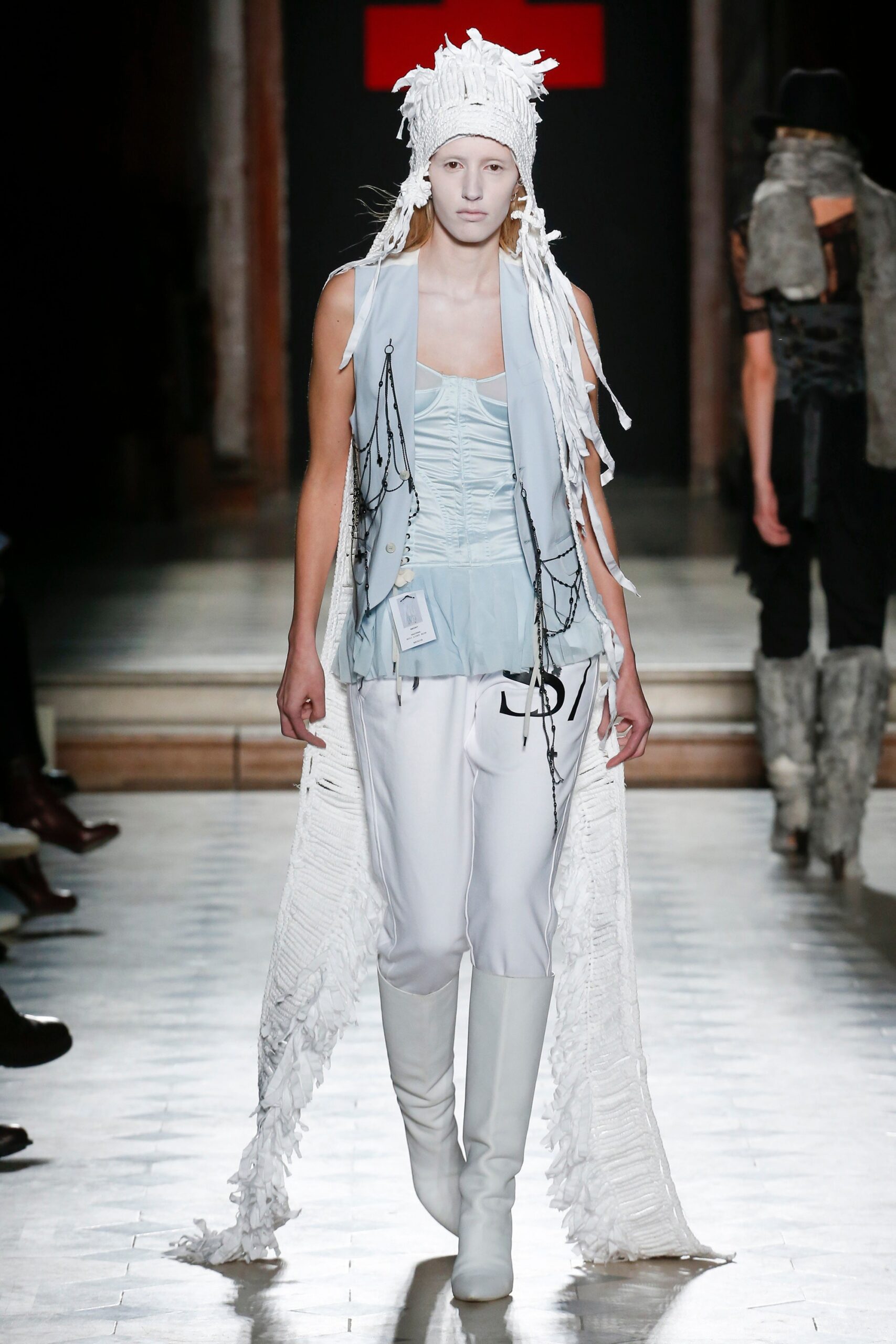light blue silk top with white pants