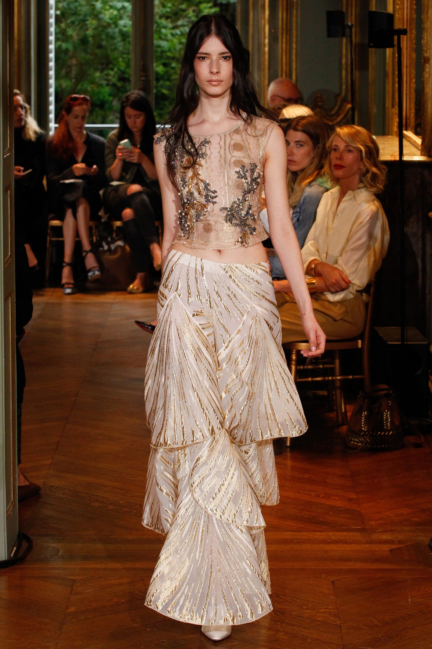 white silk fitted tiered pleated flowing skirt