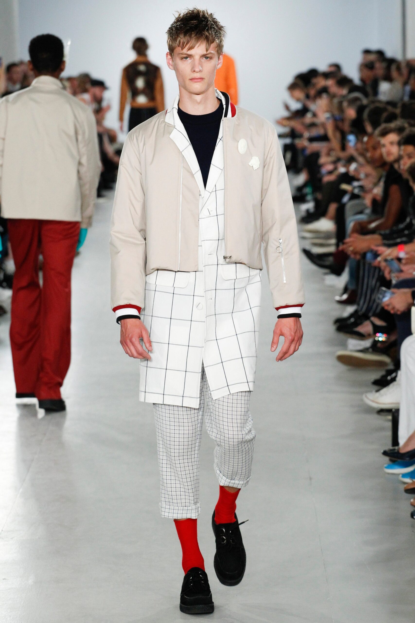 beige fitted jacket with checked shirt