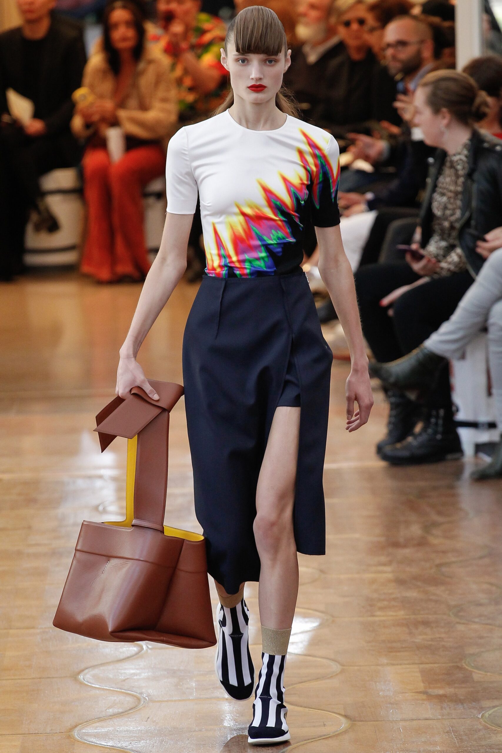 fitted multi-colored top and navy skirt