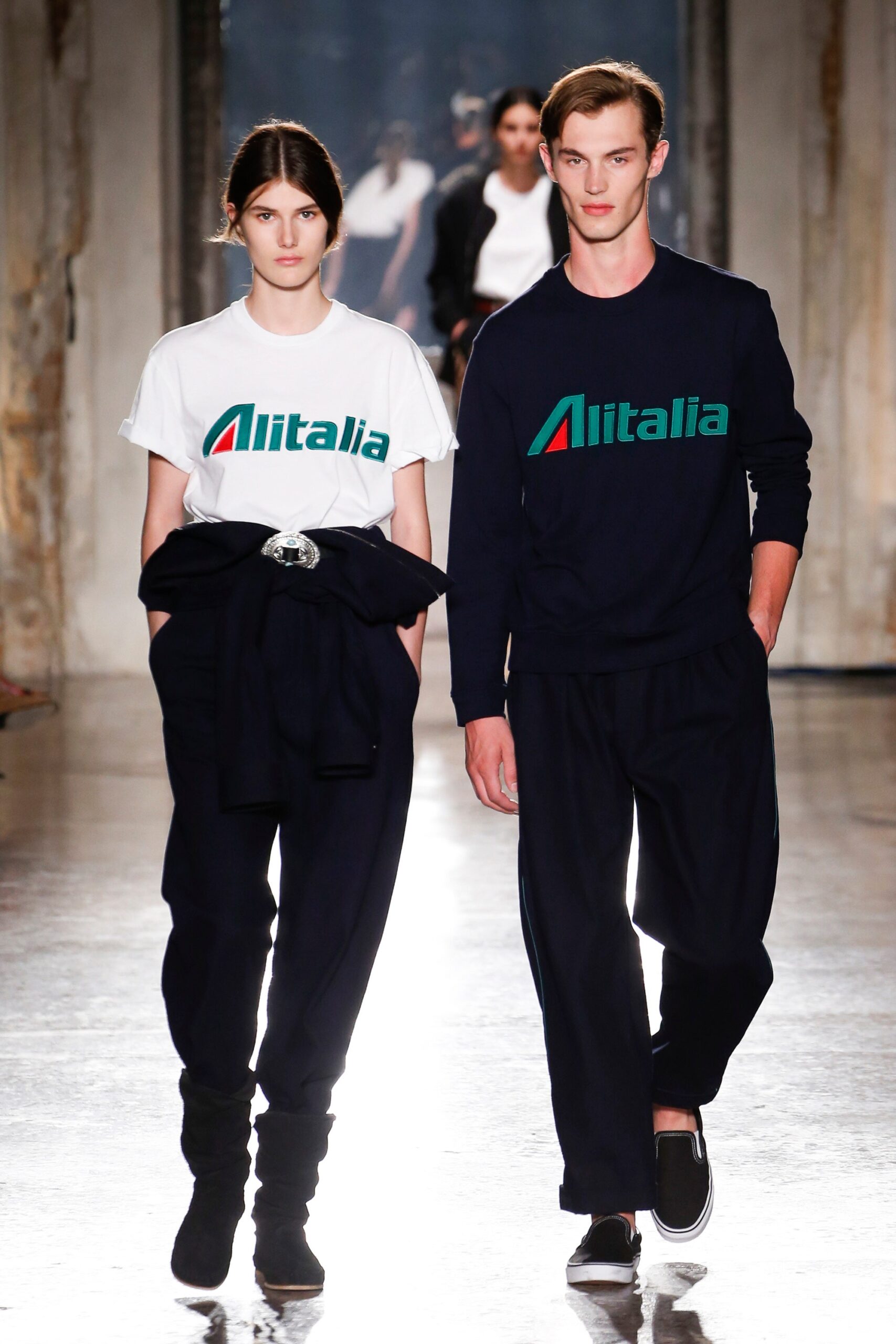 white printed t-shirt and black pants