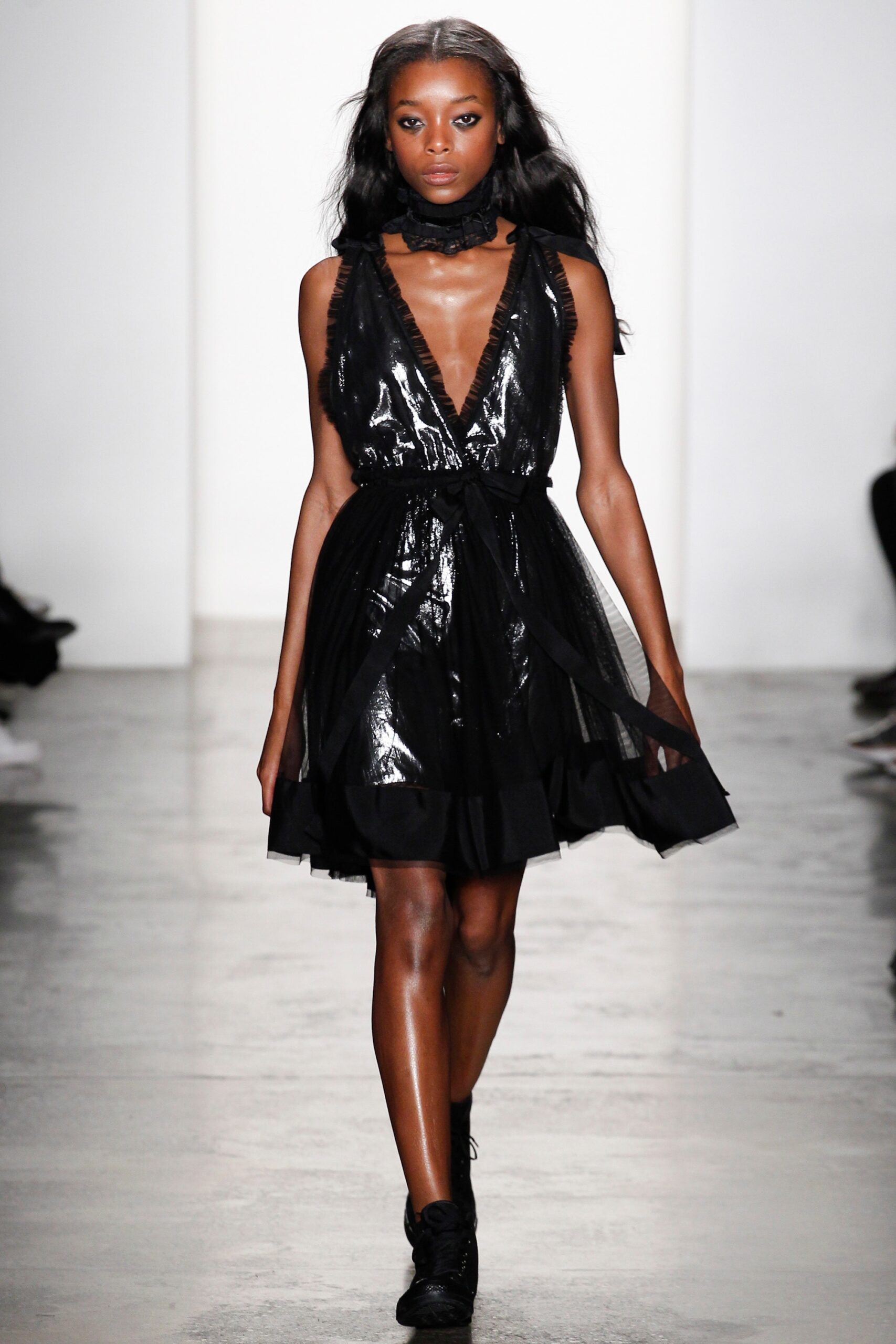 black shiny sleeveless dress