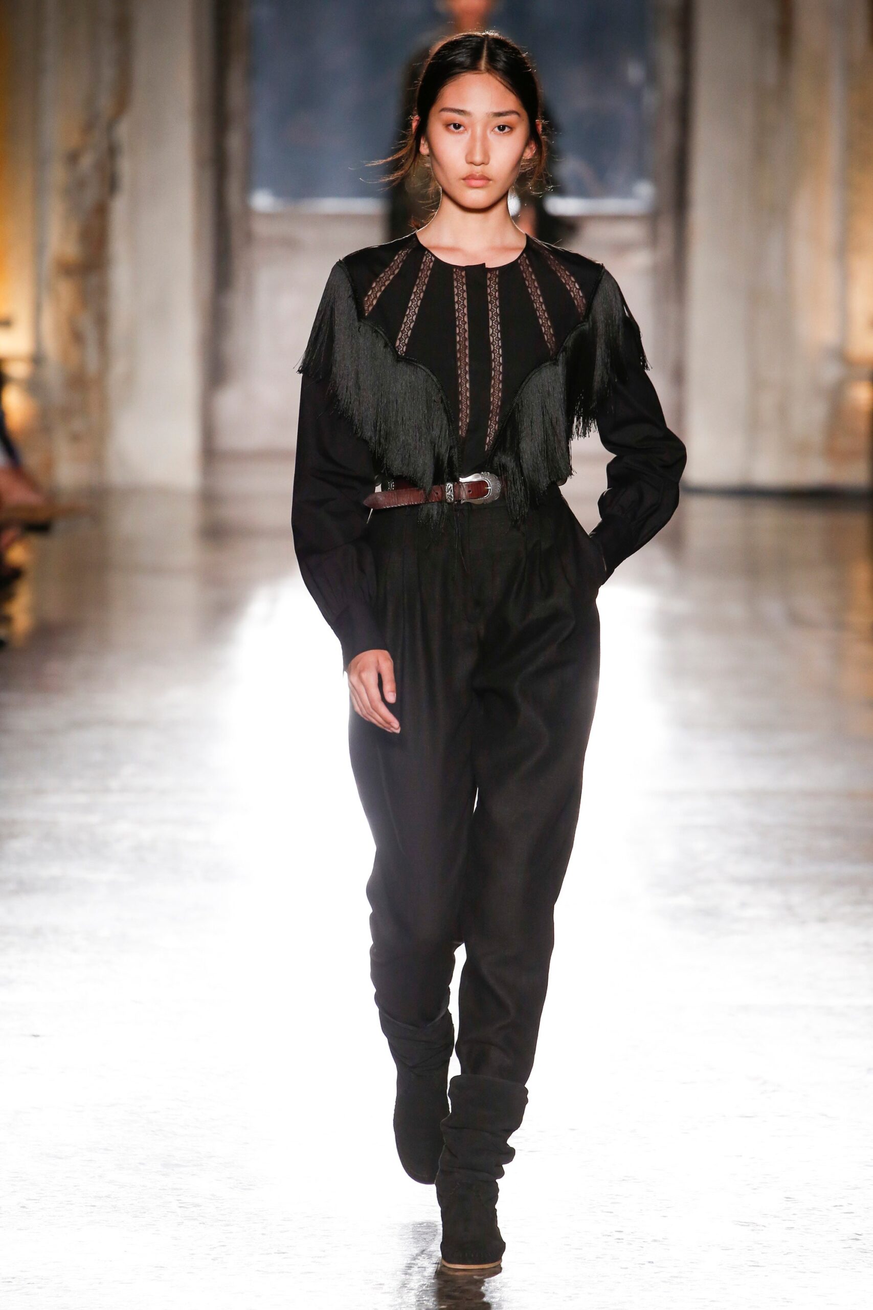 black fitted jumpsuit with fringe