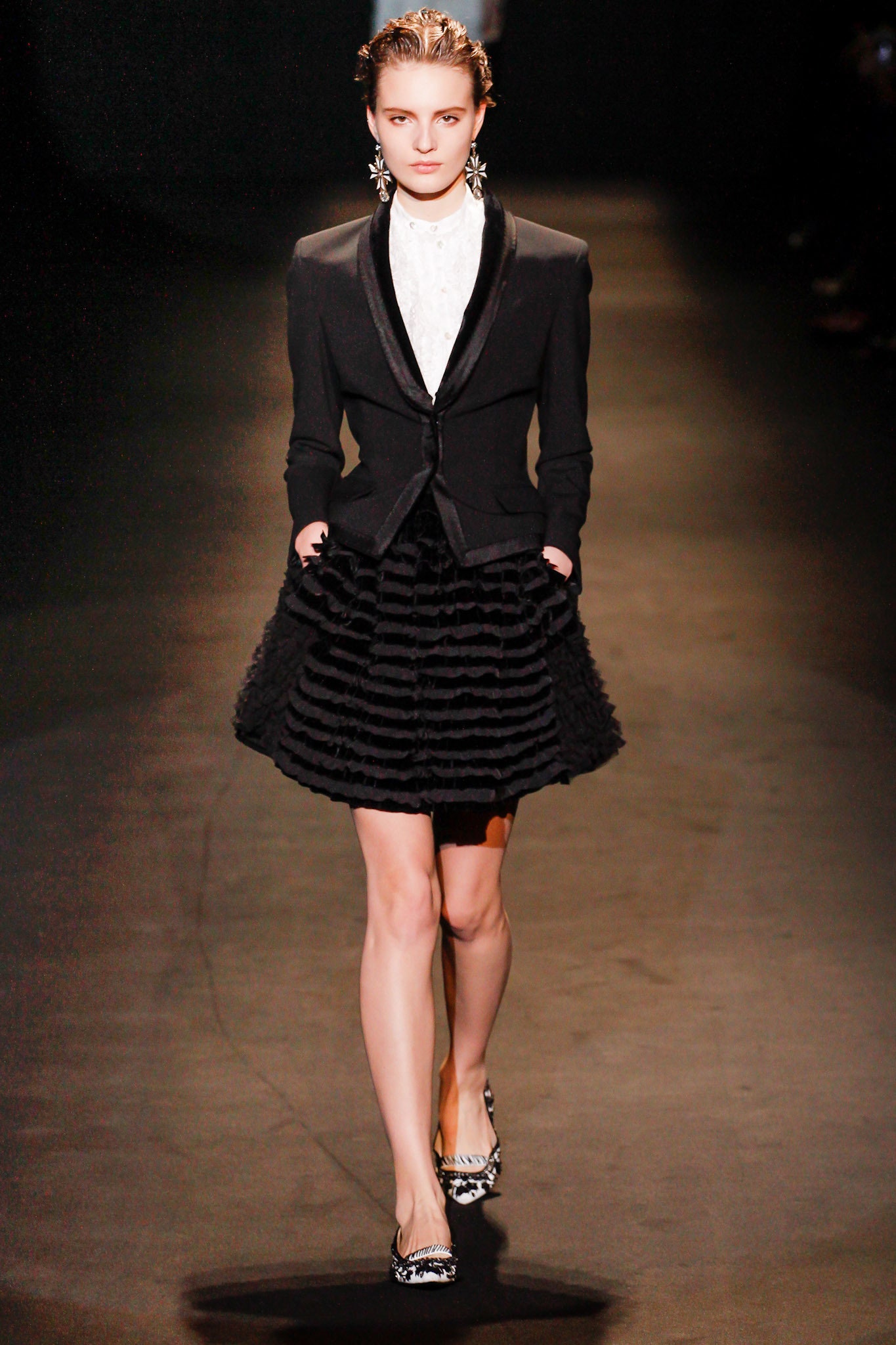 black blazer with pleated skirt