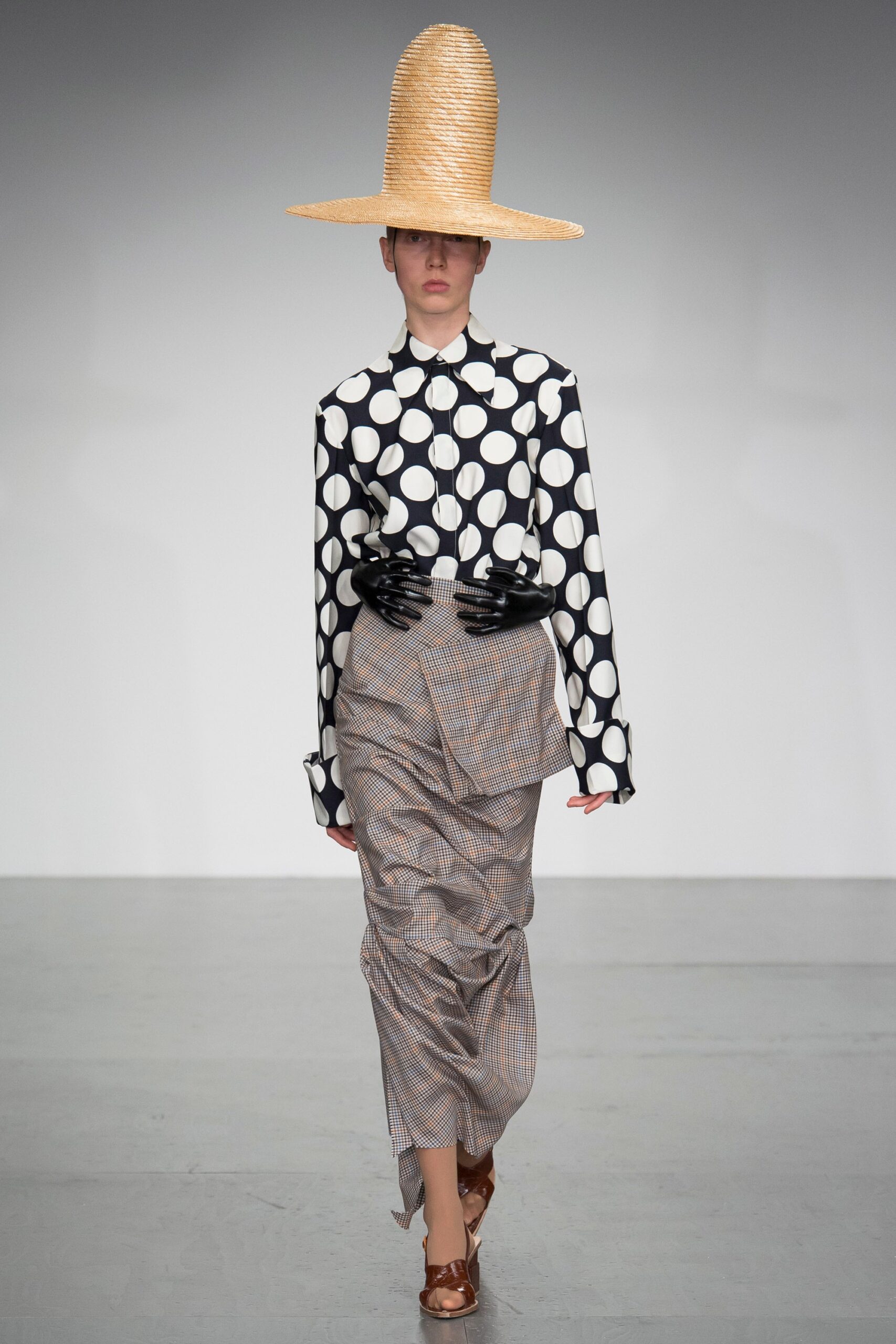 polka-dot shirt and pleated skirt