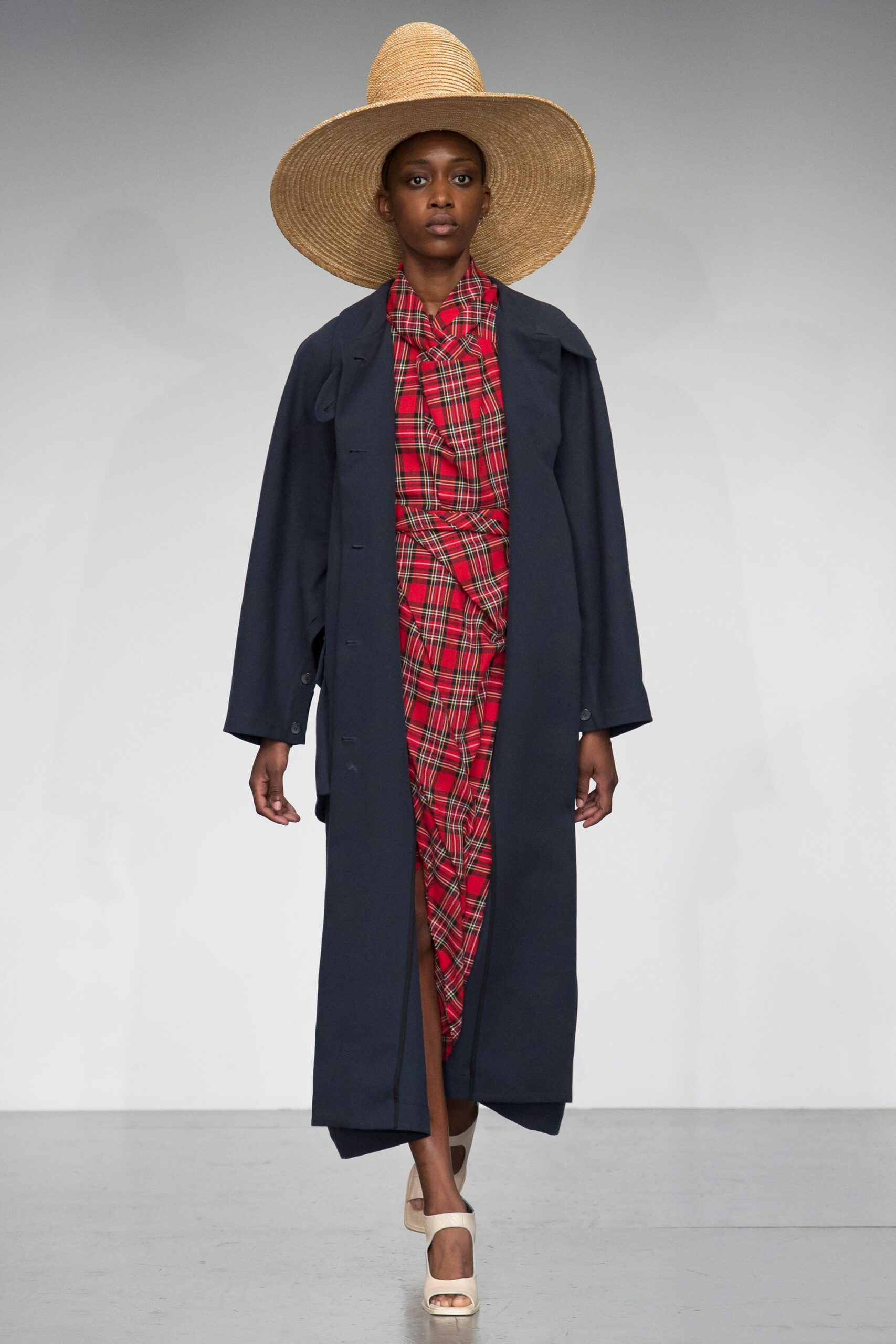navy coat with red plaid dress