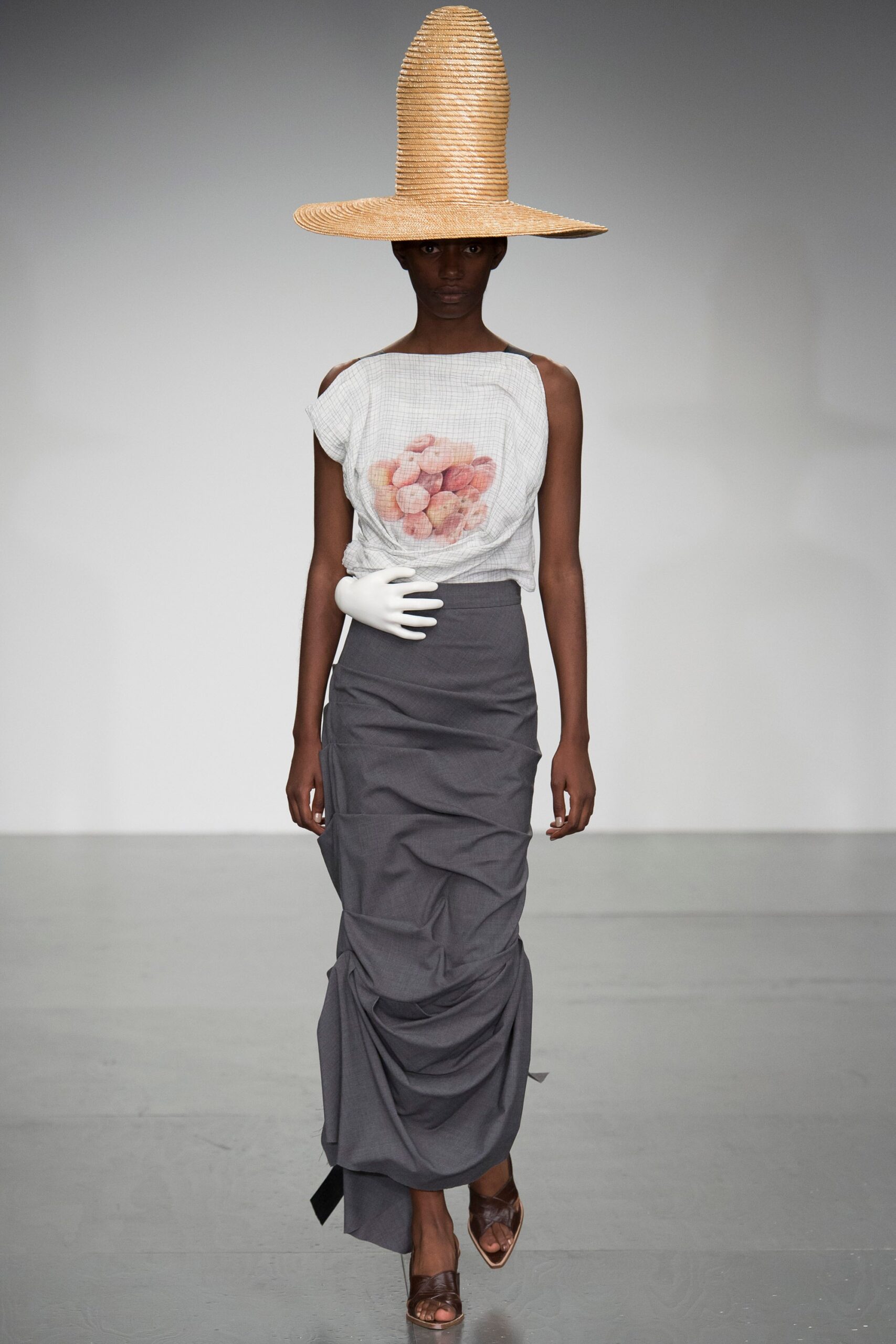 white relaxed top gray skirt