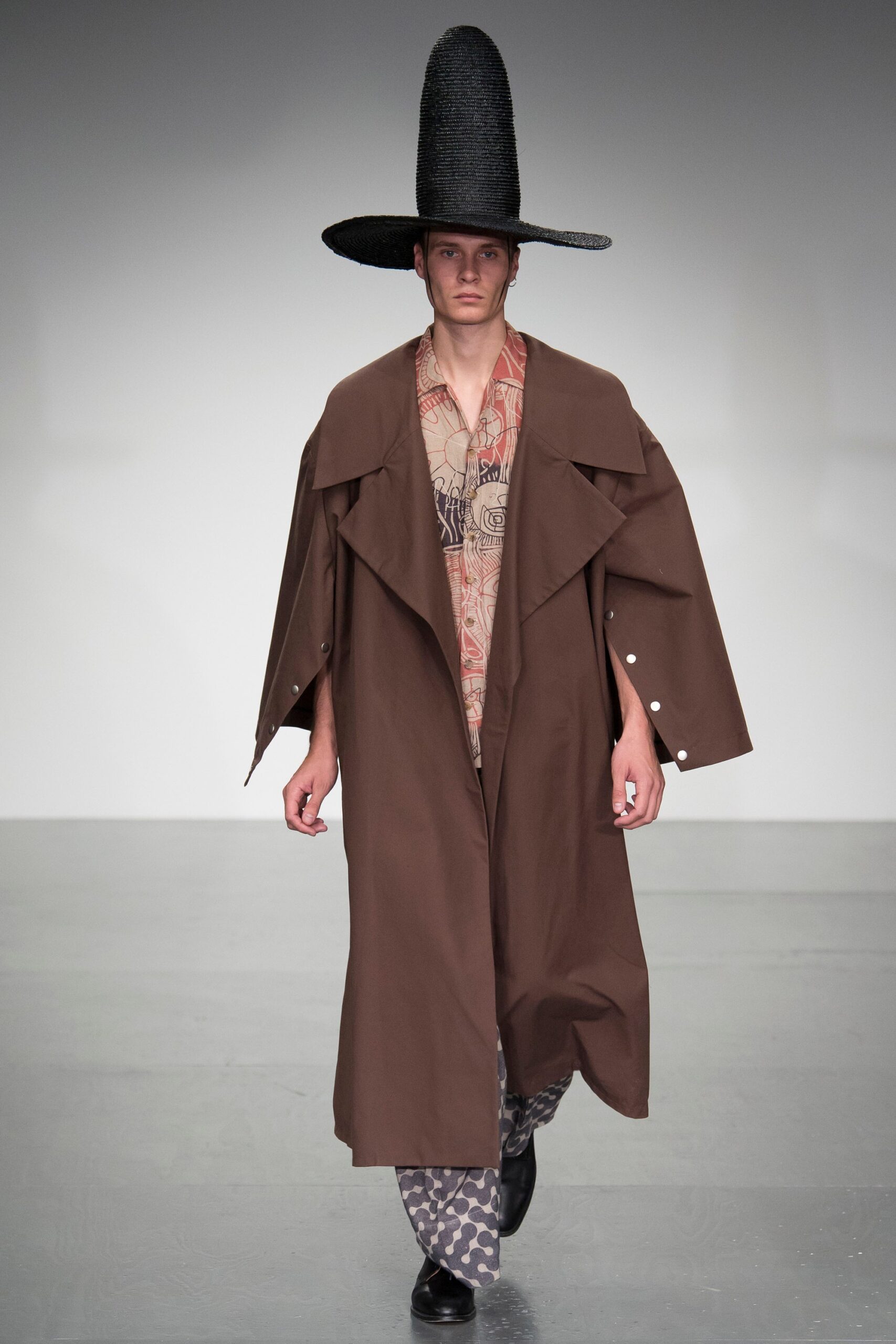 brown coat with printed shirt