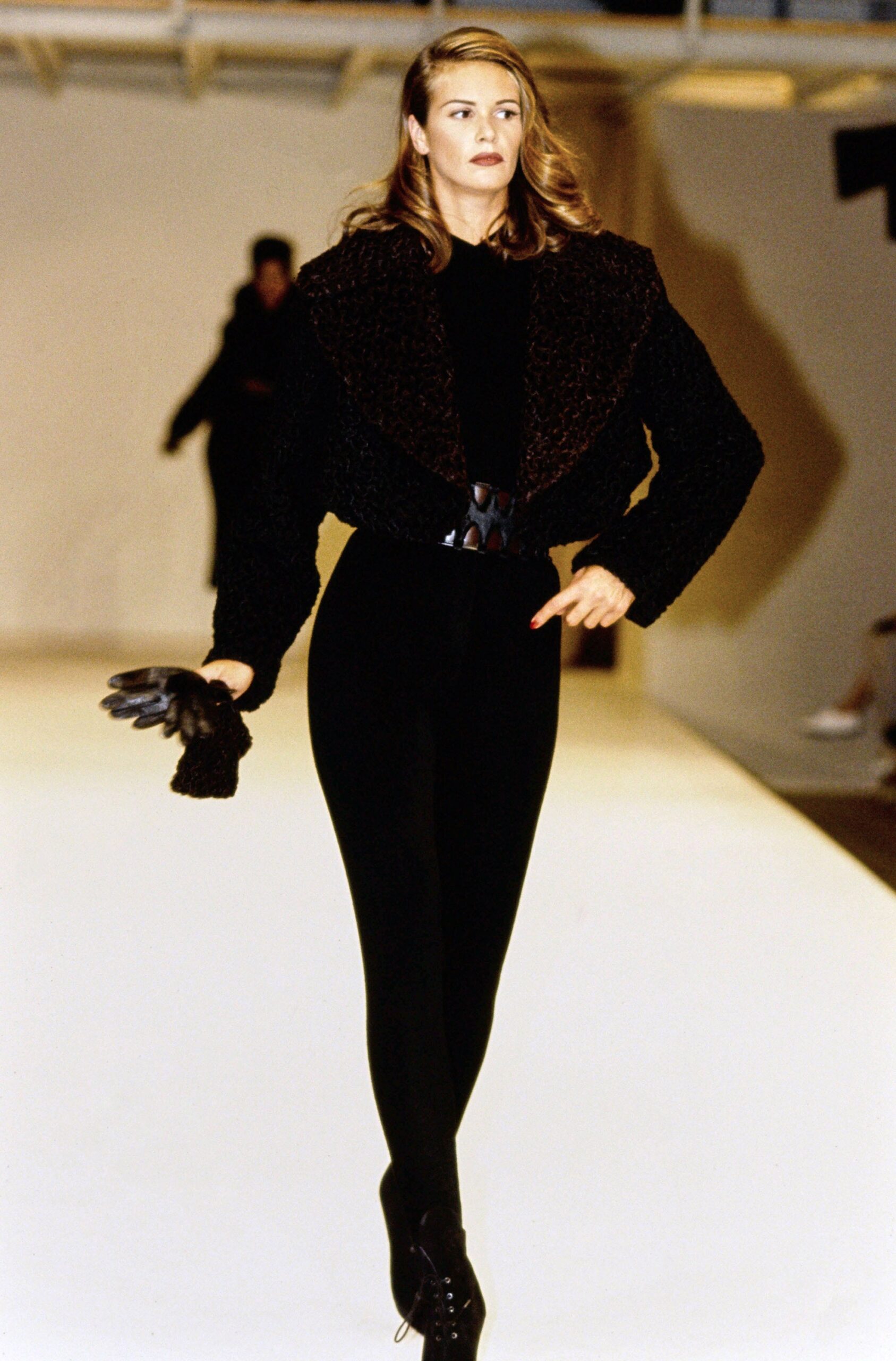 black fur jacket with fitted pants