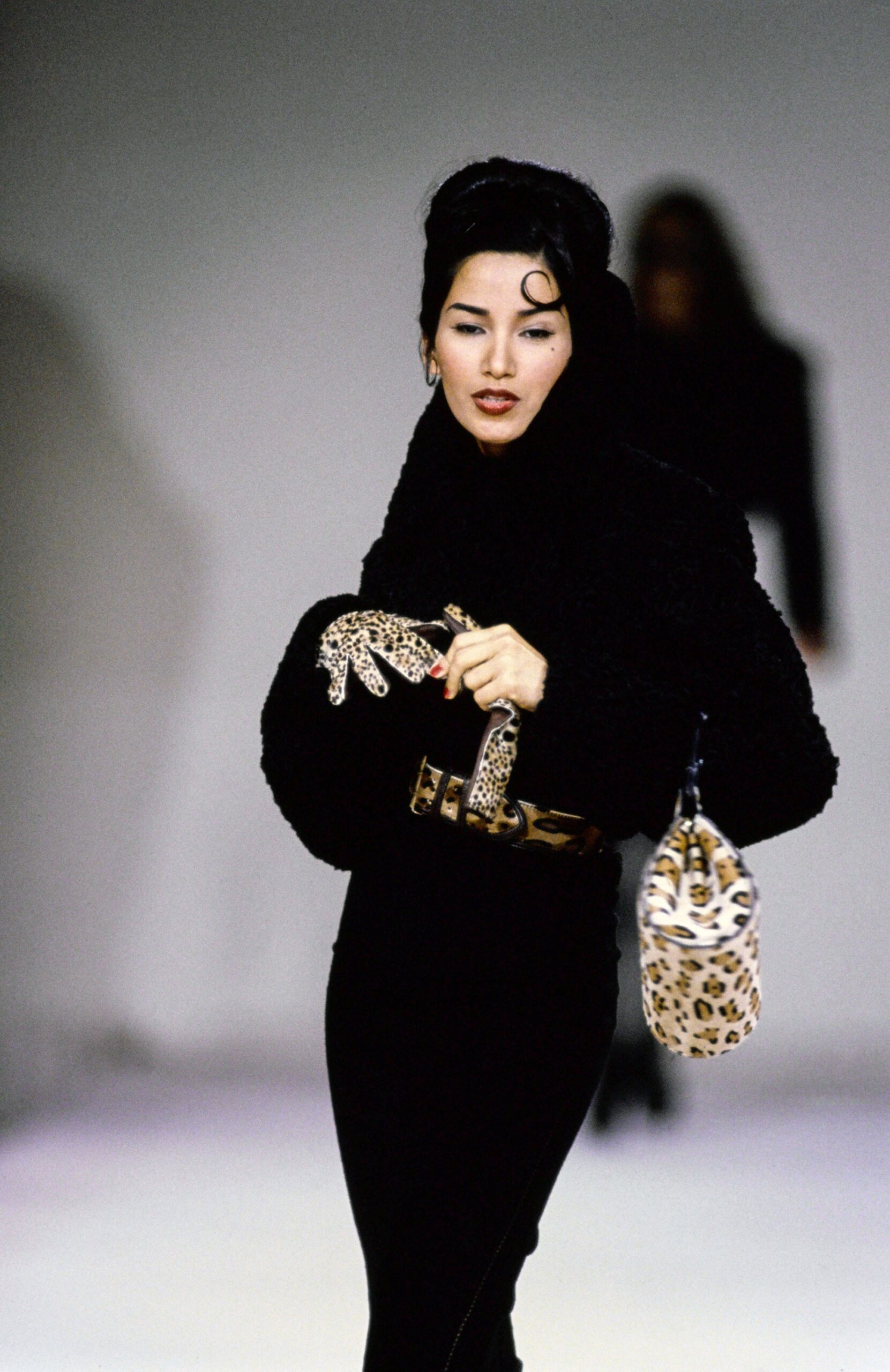 black faux-fur coat and dress