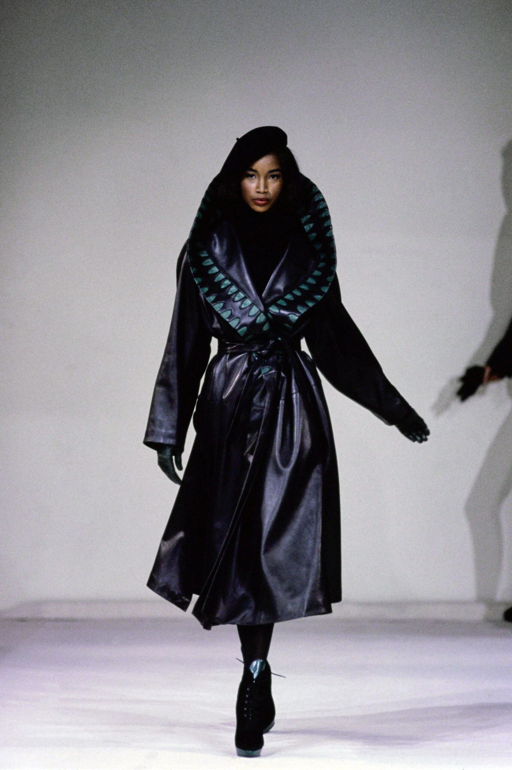 black leather belted coat
