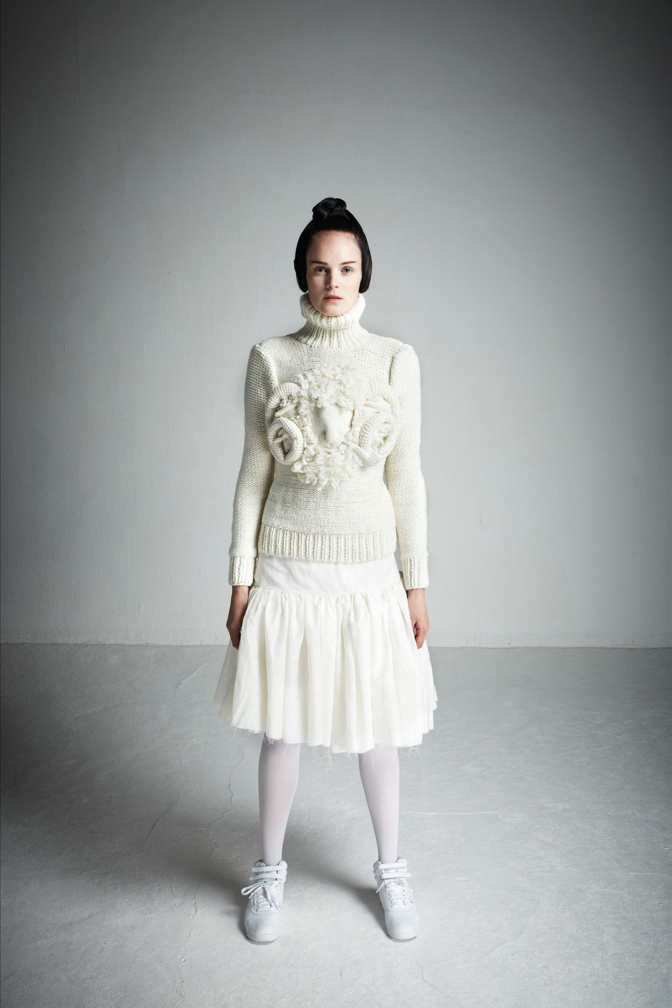 white wool sweater and skirt